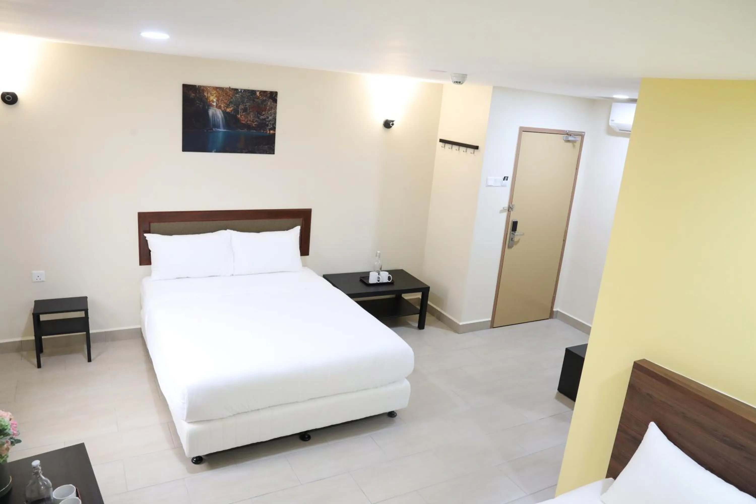 Bedroom, Bed in Capital O 90897 Island City Hotel