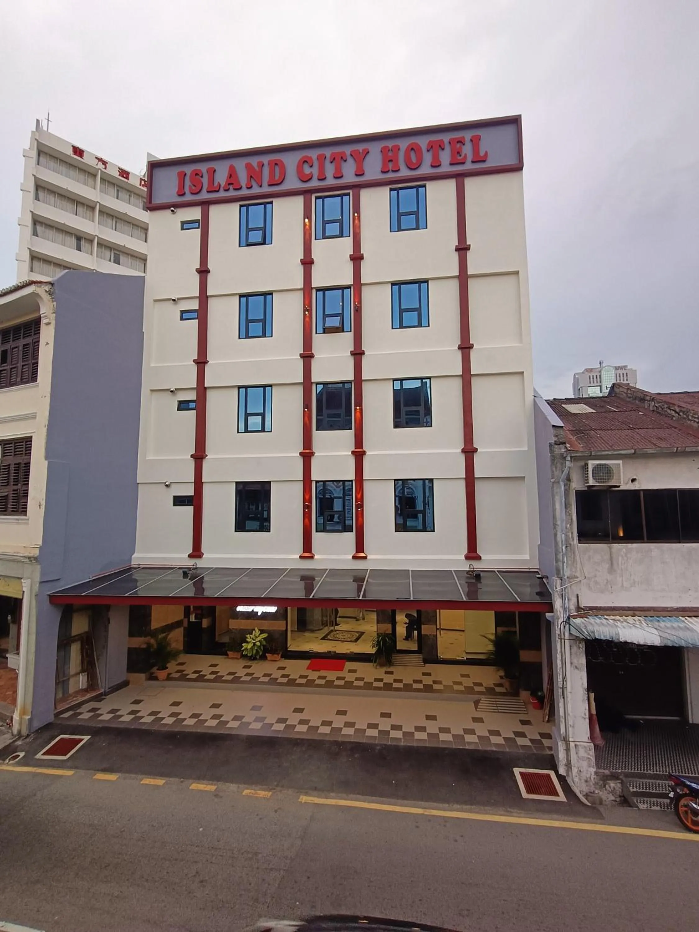 Facade/entrance in Capital O 90897 Island City Hotel