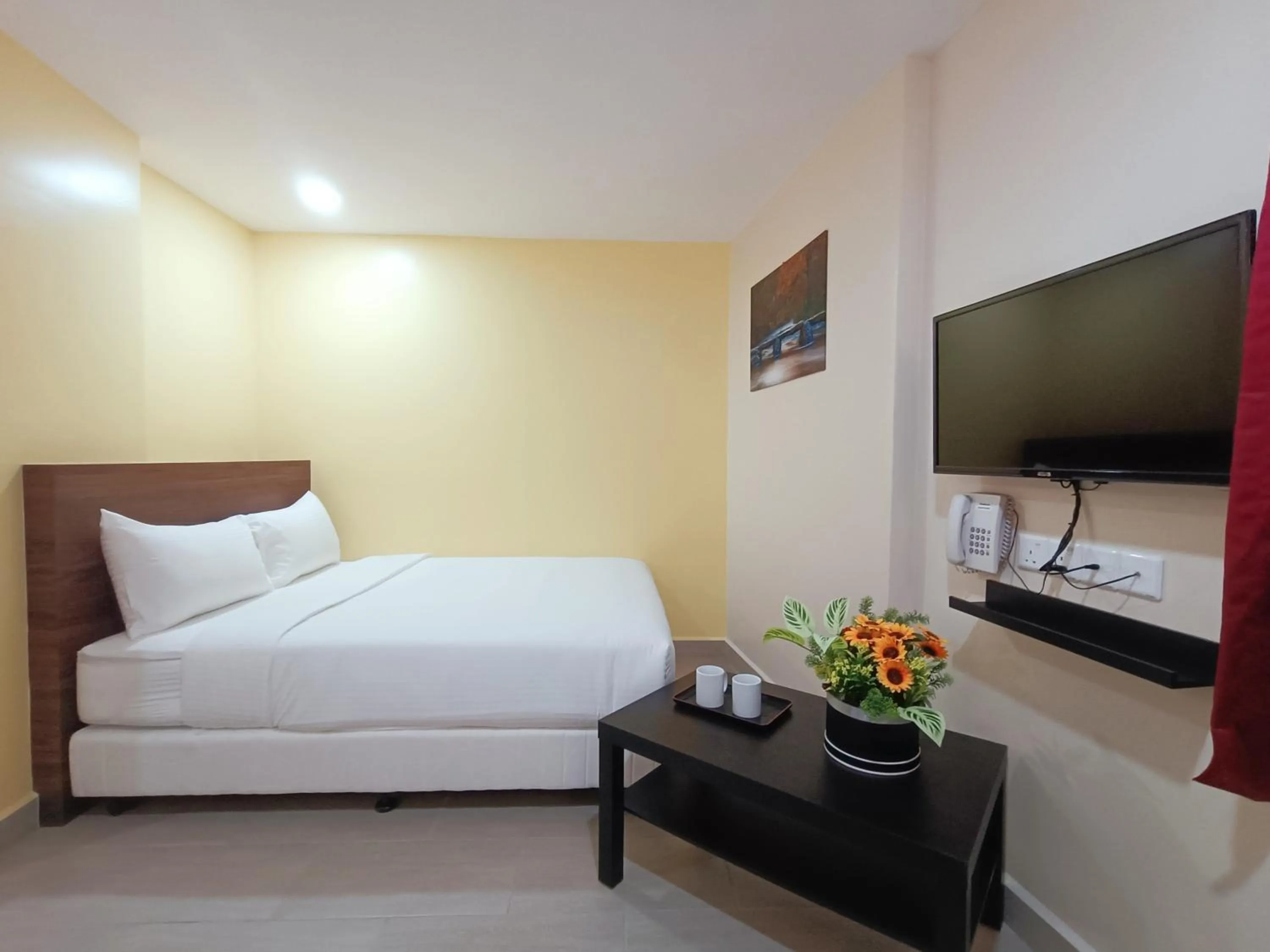 Bedroom, Bed in Capital O 90897 Island City Hotel