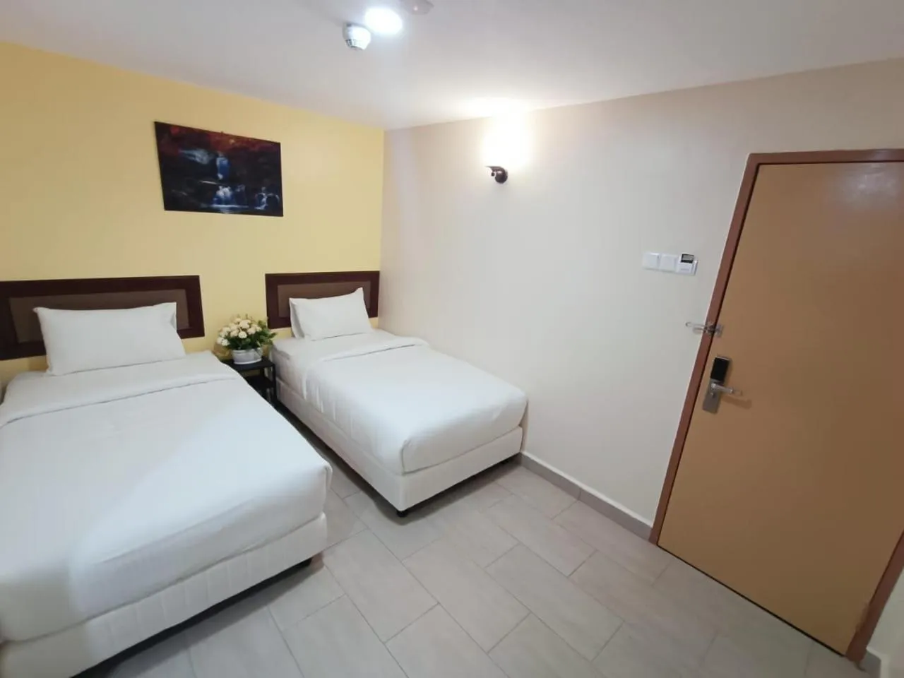 Bedroom, Bed in Capital O 90897 Island City Hotel