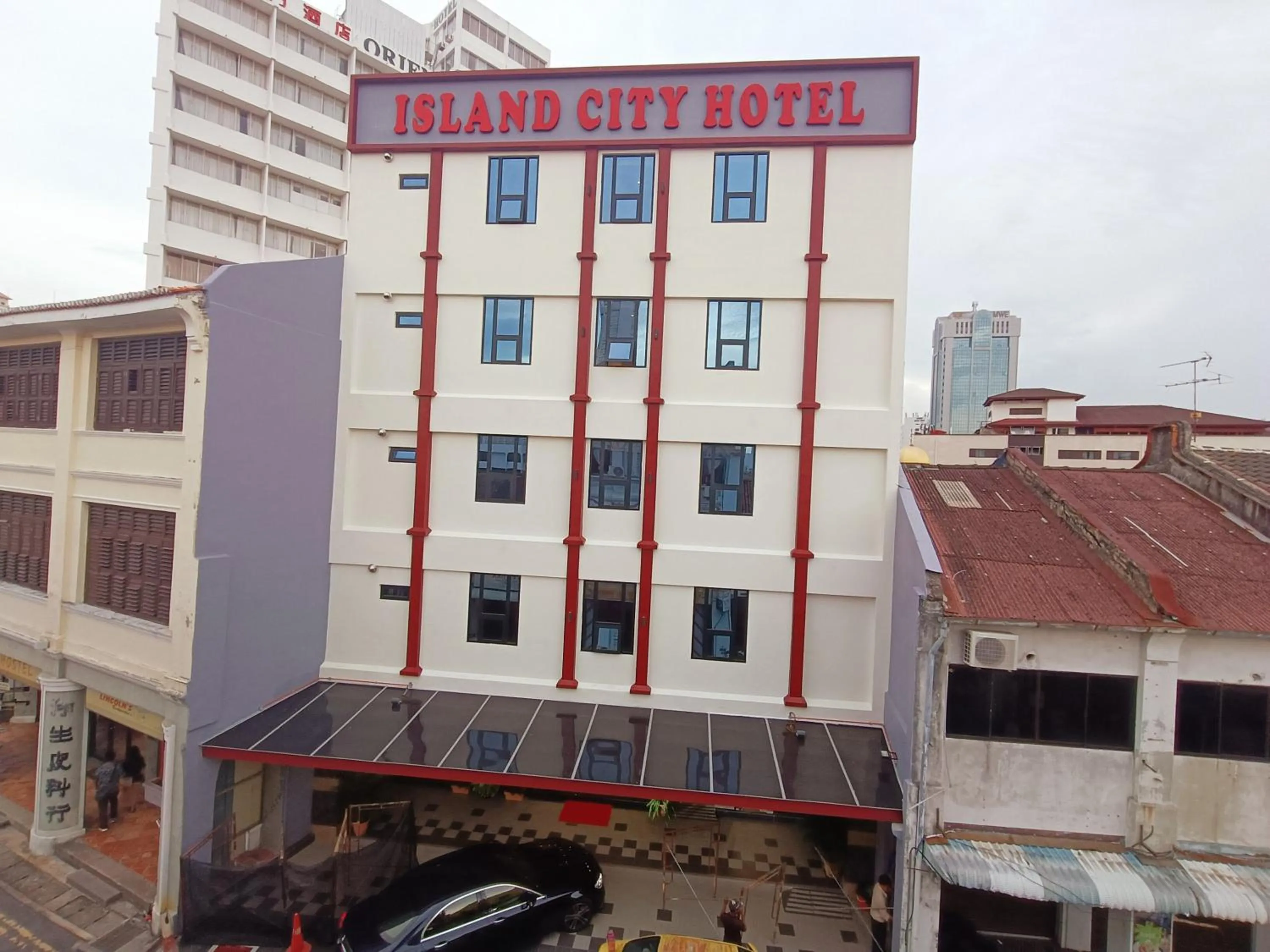 Facade/entrance in Capital O 90897 Island City Hotel