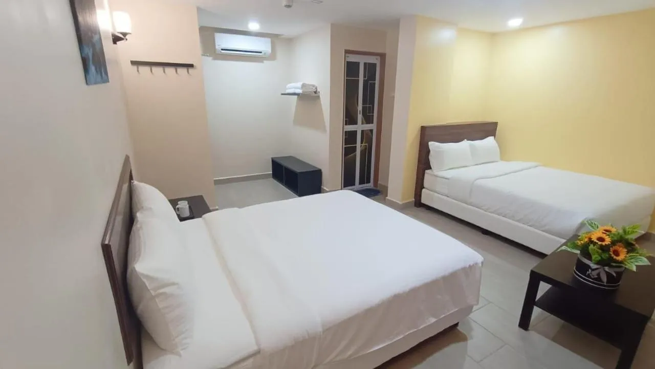 Bedroom, Bed in Capital O 90897 Island City Hotel