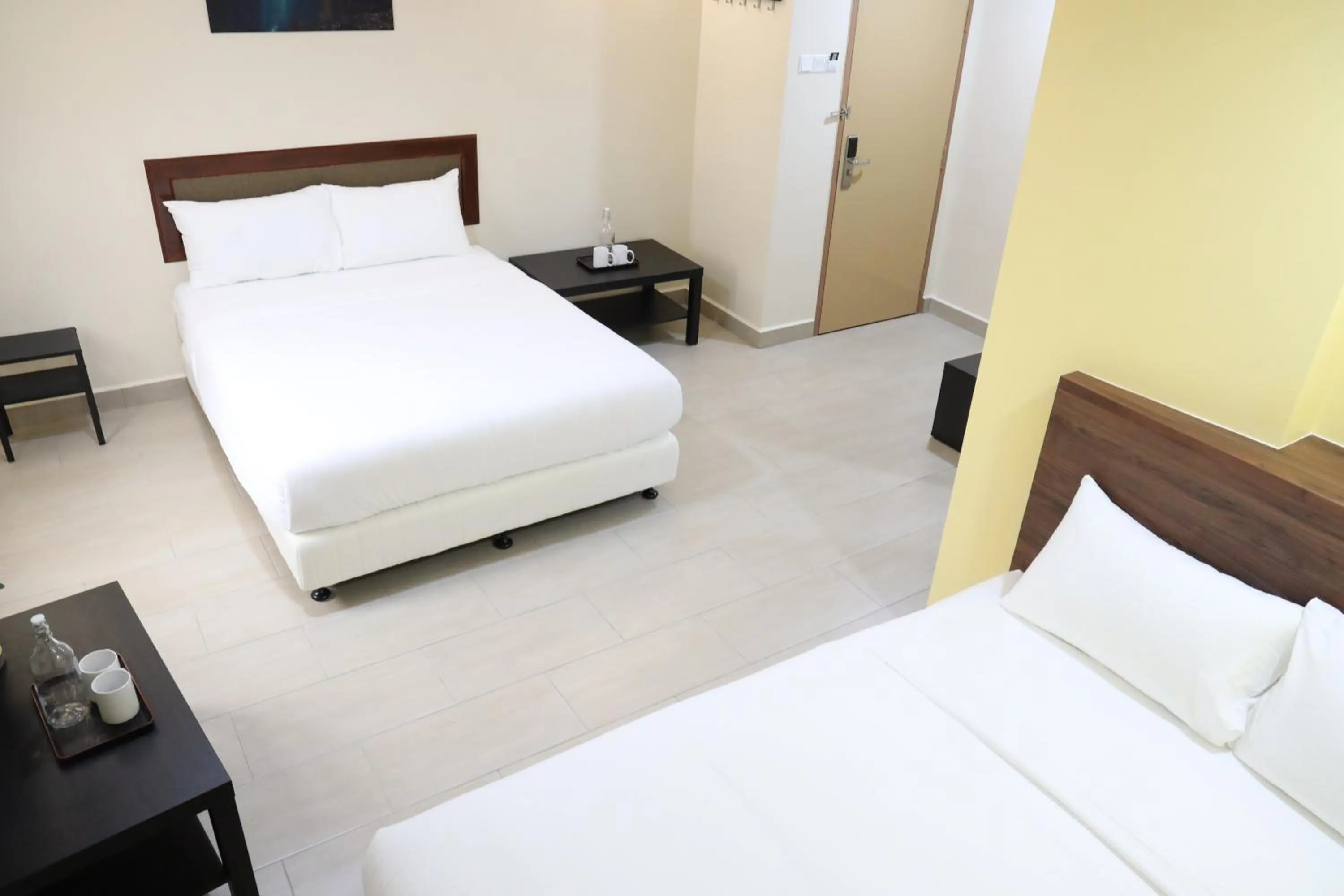 Bedroom, Bed in Capital O 90897 Island City Hotel