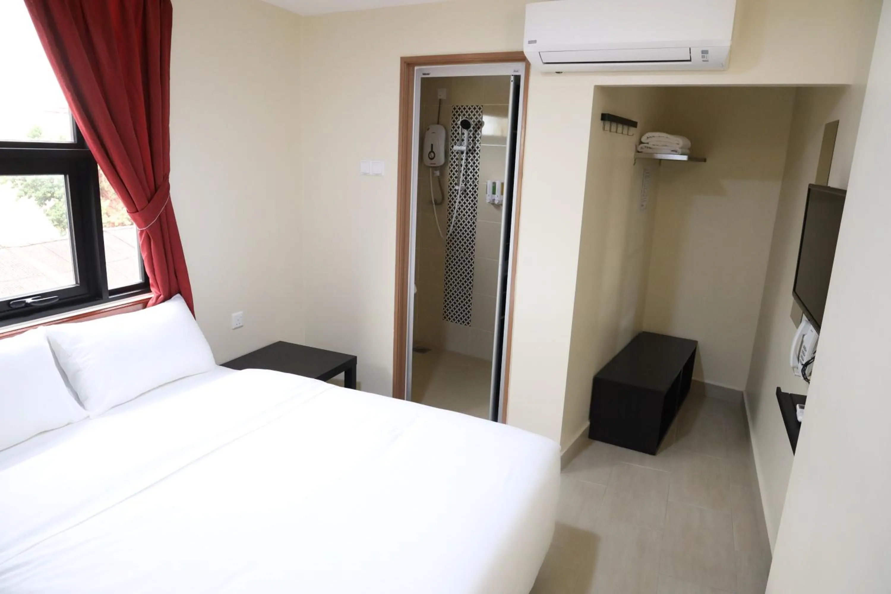 Bedroom, Bed in Capital O 90897 Island City Hotel