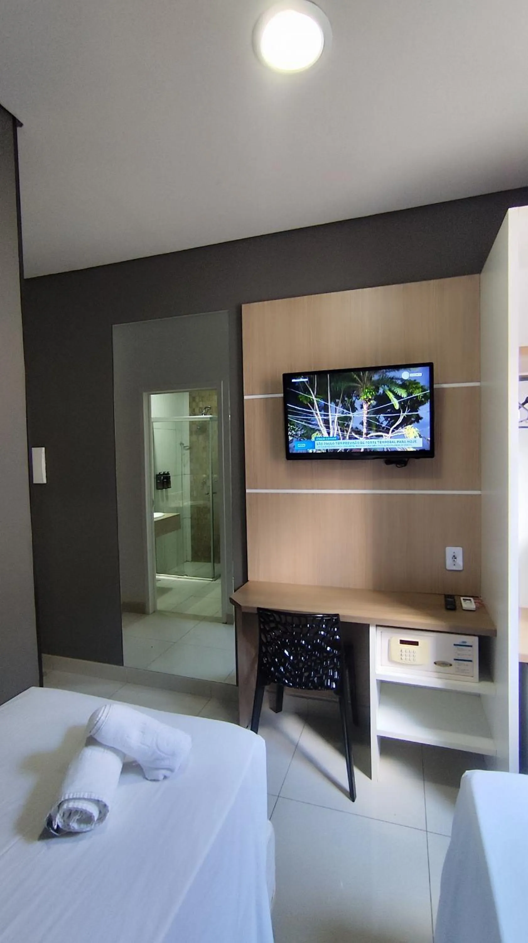 Bed in Assay Plaza Hotel