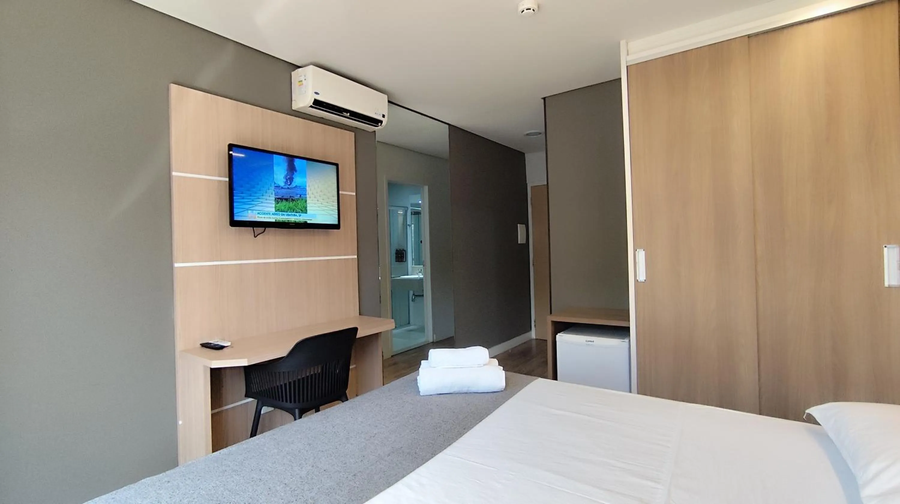 Bed in Assay Plaza Hotel