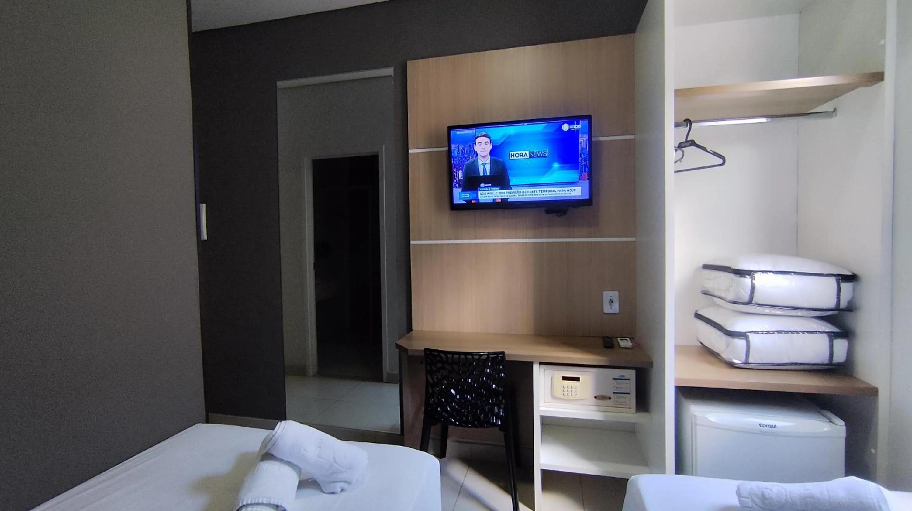 Bed in Assay Plaza Hotel