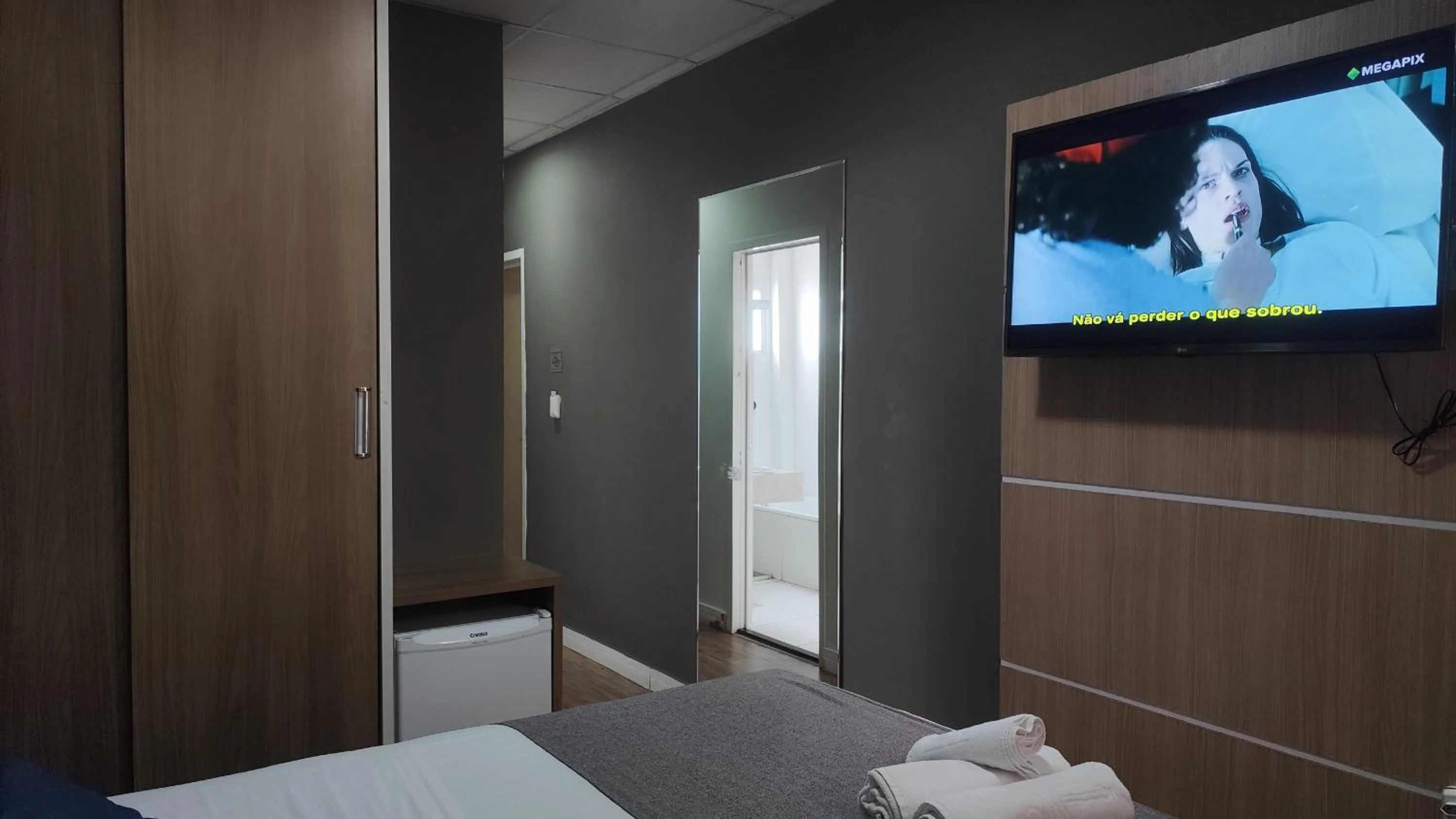 Bed in Assay Plaza Hotel