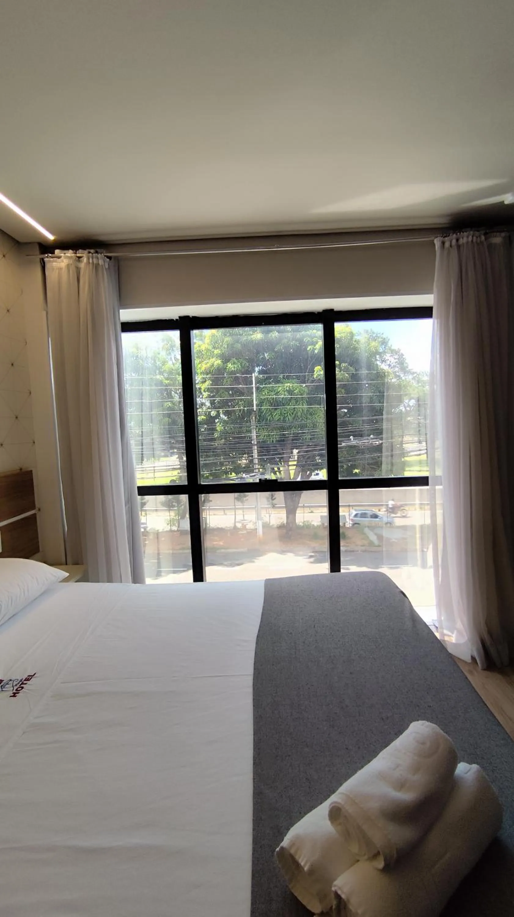 Bed in Assay Plaza Hotel