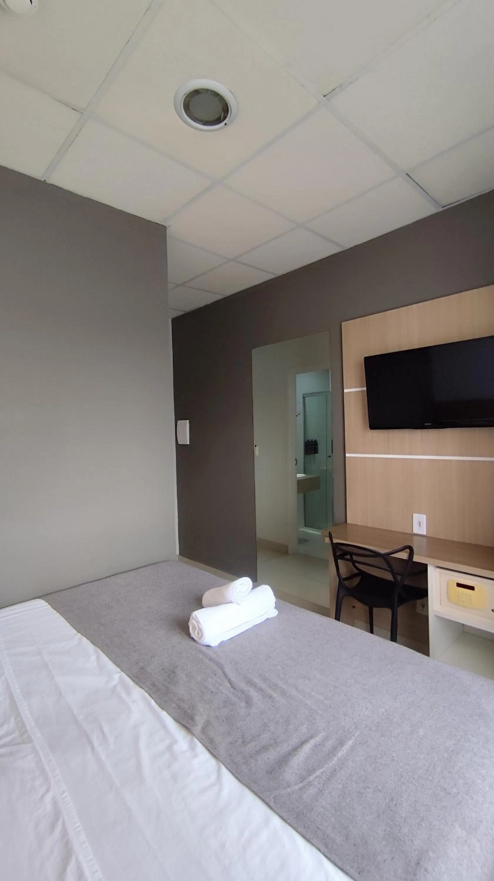 Bed in Assay Plaza Hotel