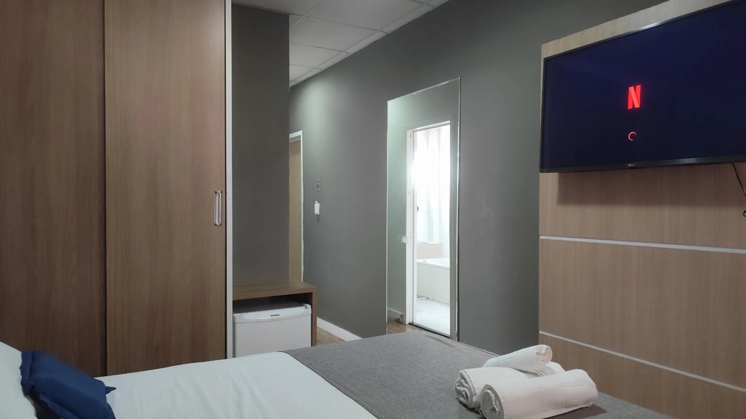 Bed in Assay Plaza Hotel