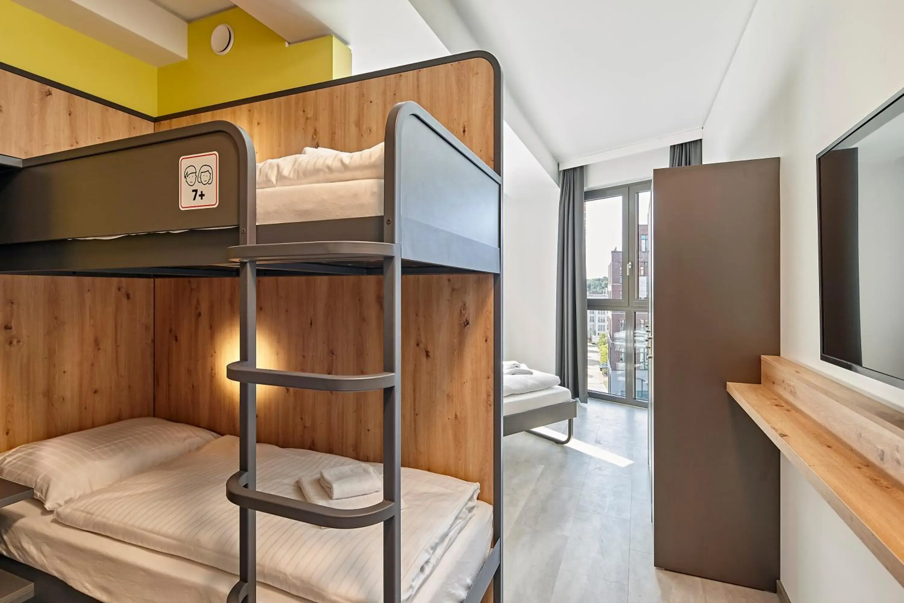 Bed in 6-Bed Mixed Dormitory Room in MEININGER Hotel Köln West Bed in 6-Bed Mixed Dormitory Room in MEININGER Hotel Köln West