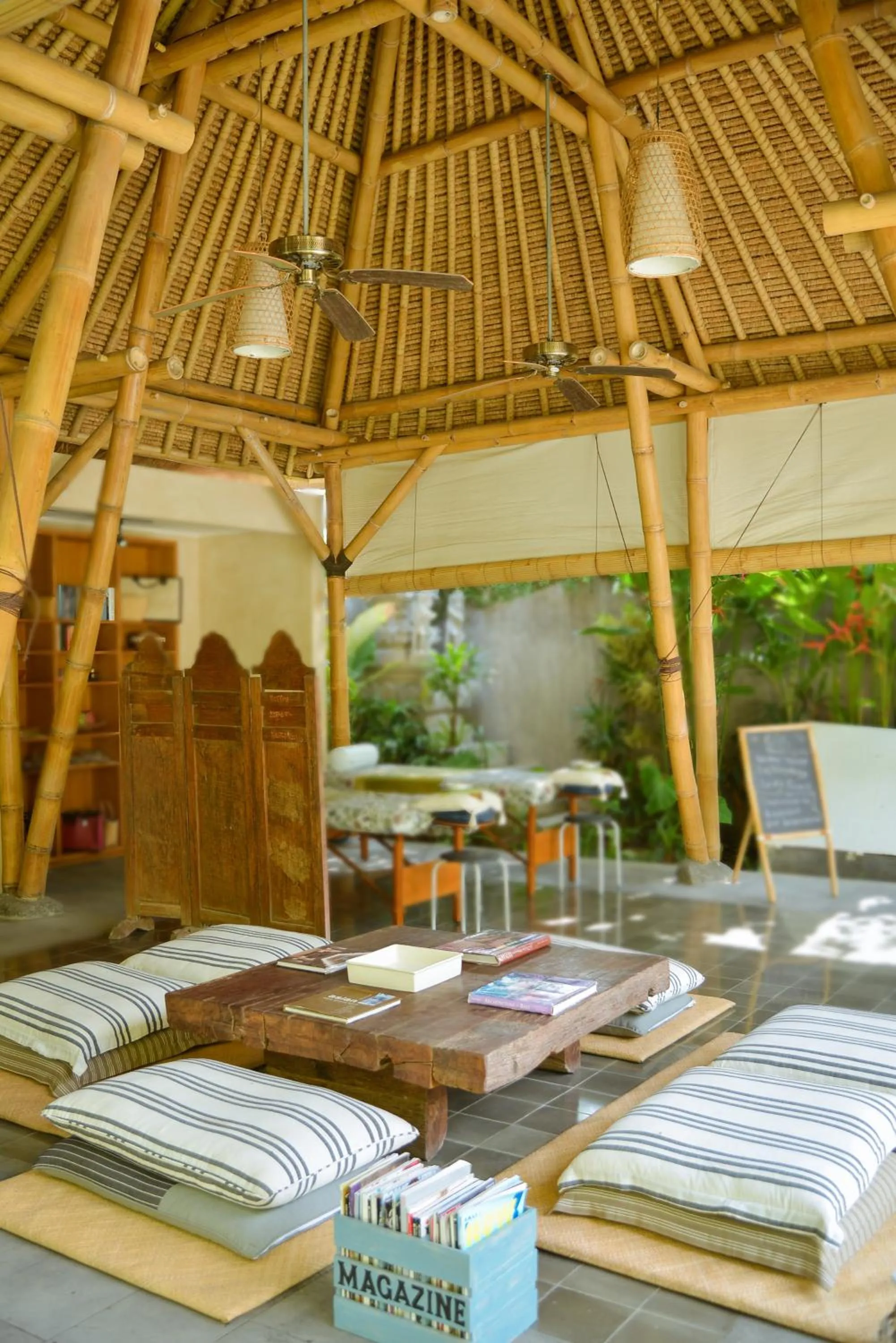 Communal lounge/ TV room in The Open House Jimbaran Bali