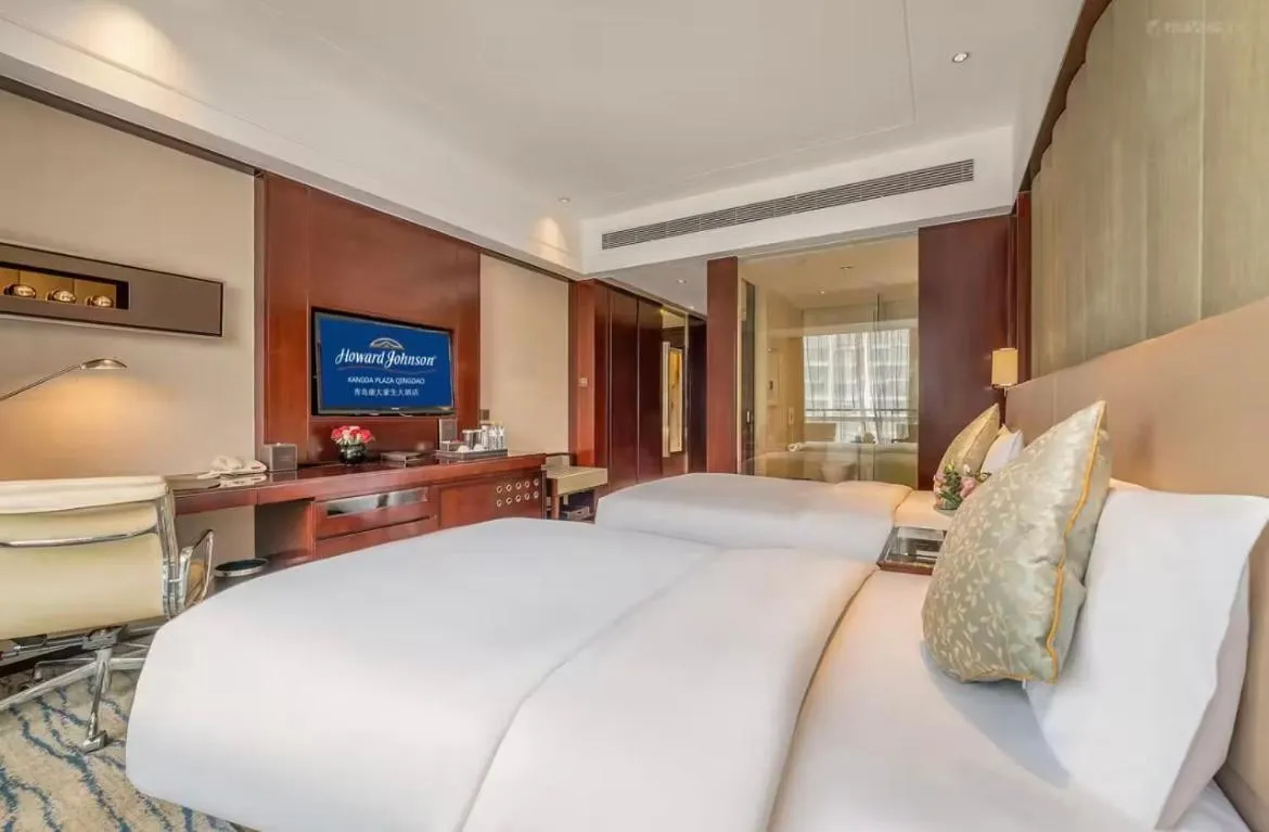 Bed in Kangda Howard Johnson Hotel Qingdao