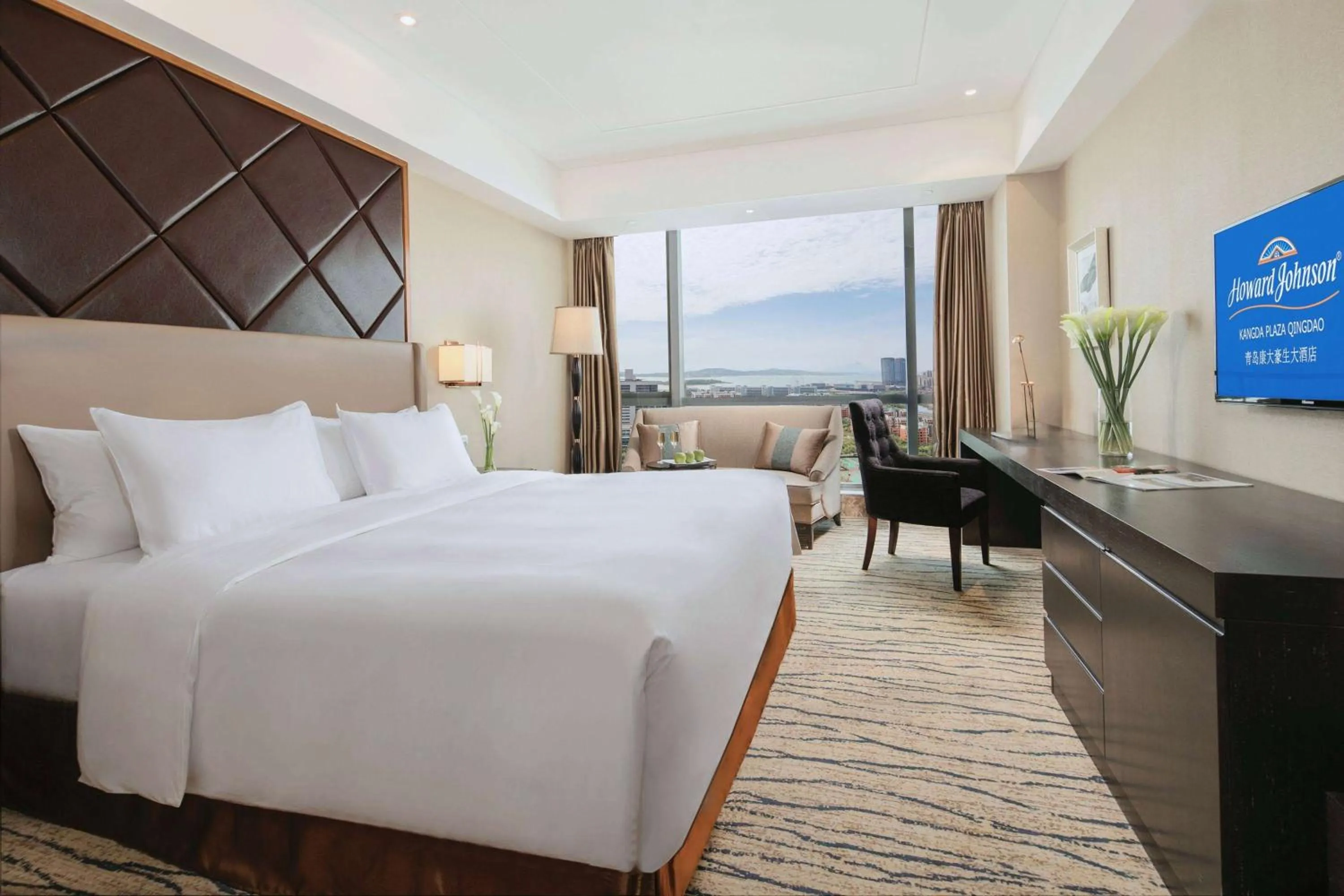 Photo of the whole room, Bed in Kangda Howard Johnson Hotel Qingdao