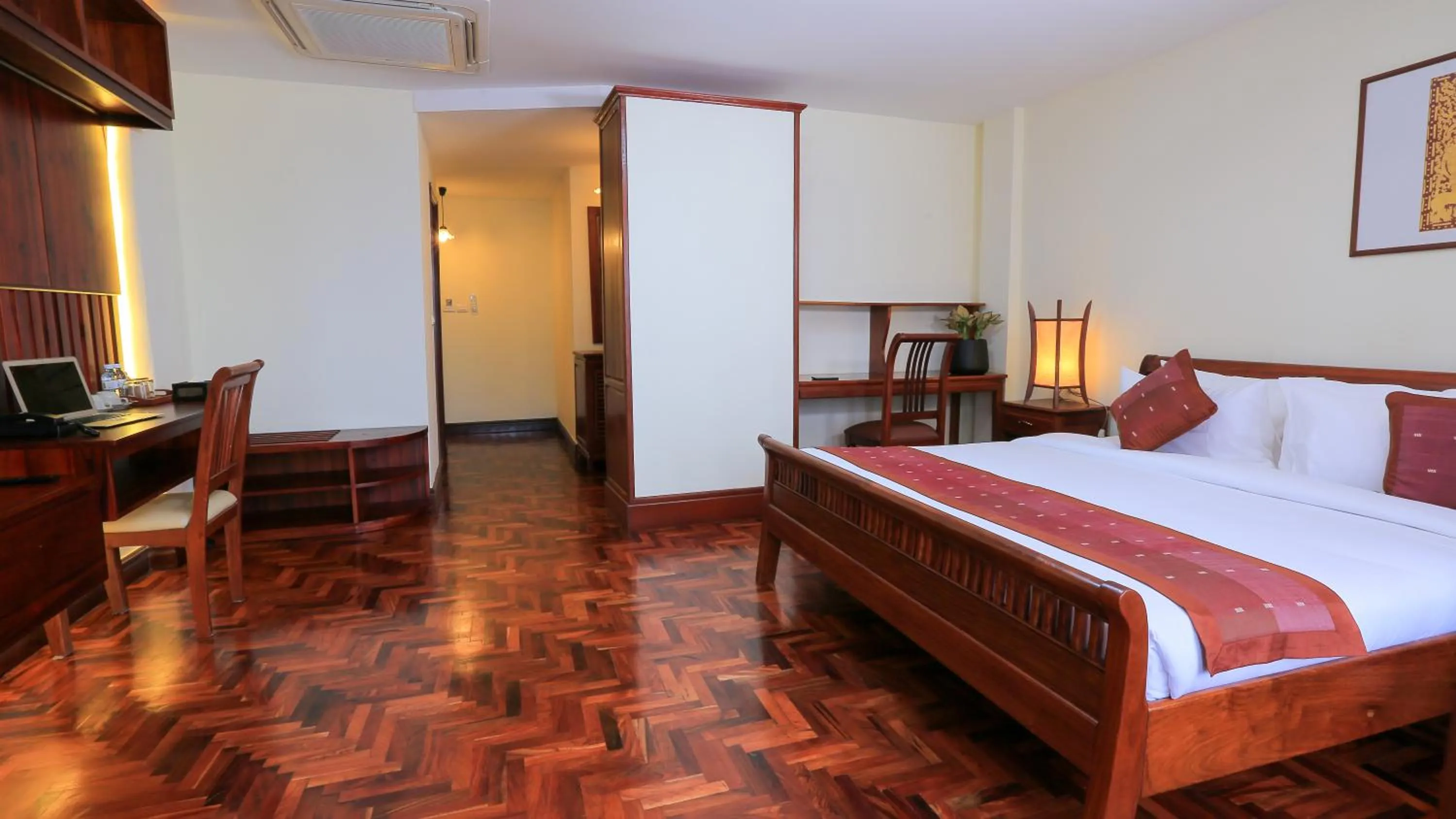 Living room, Bed in Phongsavath Boutique Hotel