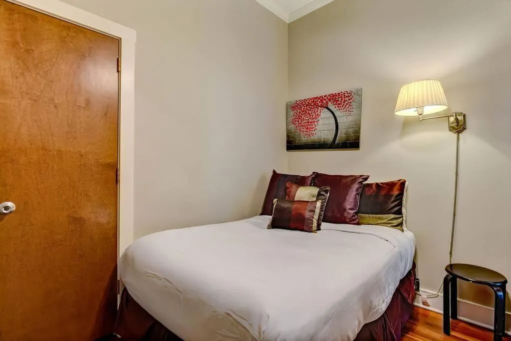 Bed in Loft steps from City Hall and River Streets