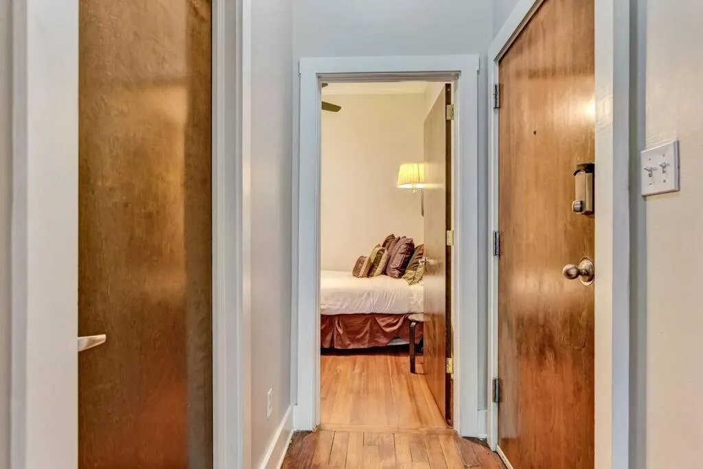 Bed in Loft steps from City Hall and River Streets