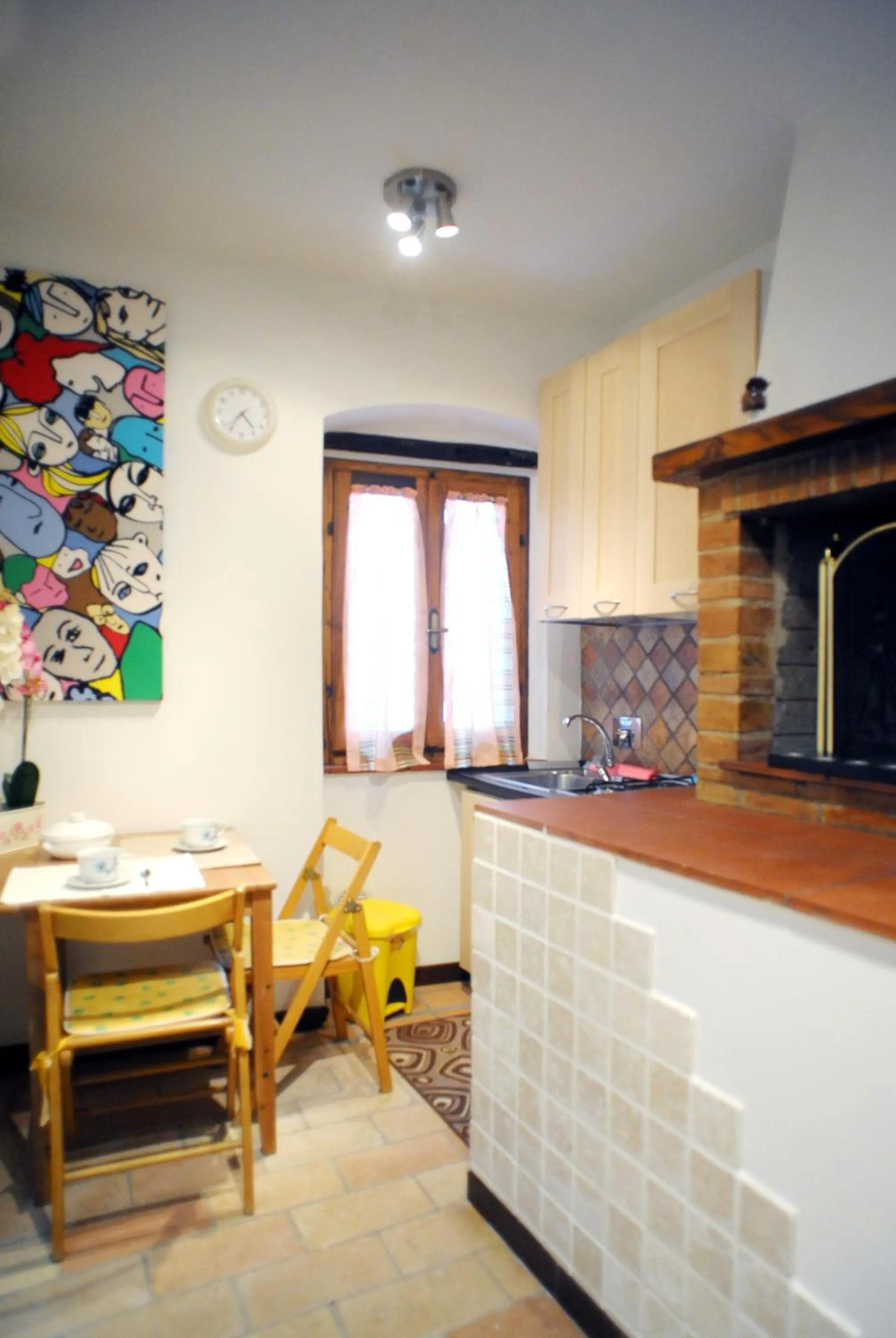 Kitchen or kitchenette in Appartamento Tulipano Rosa