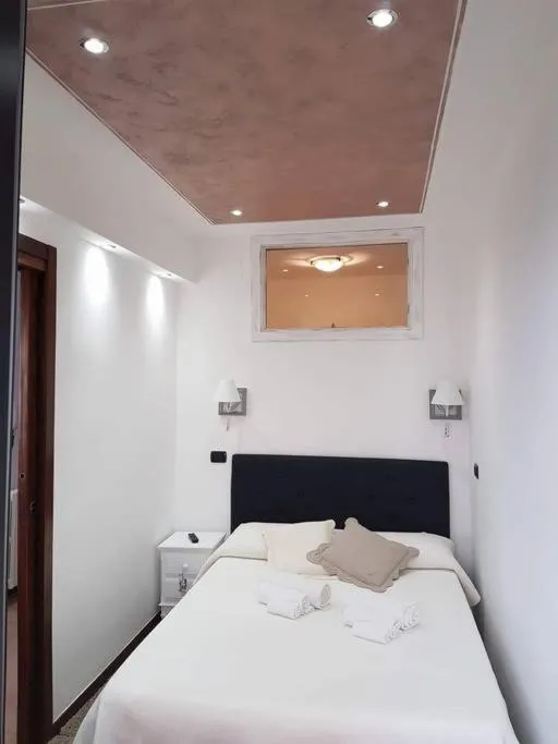 Bed in Appartamento Tulipano Rosa