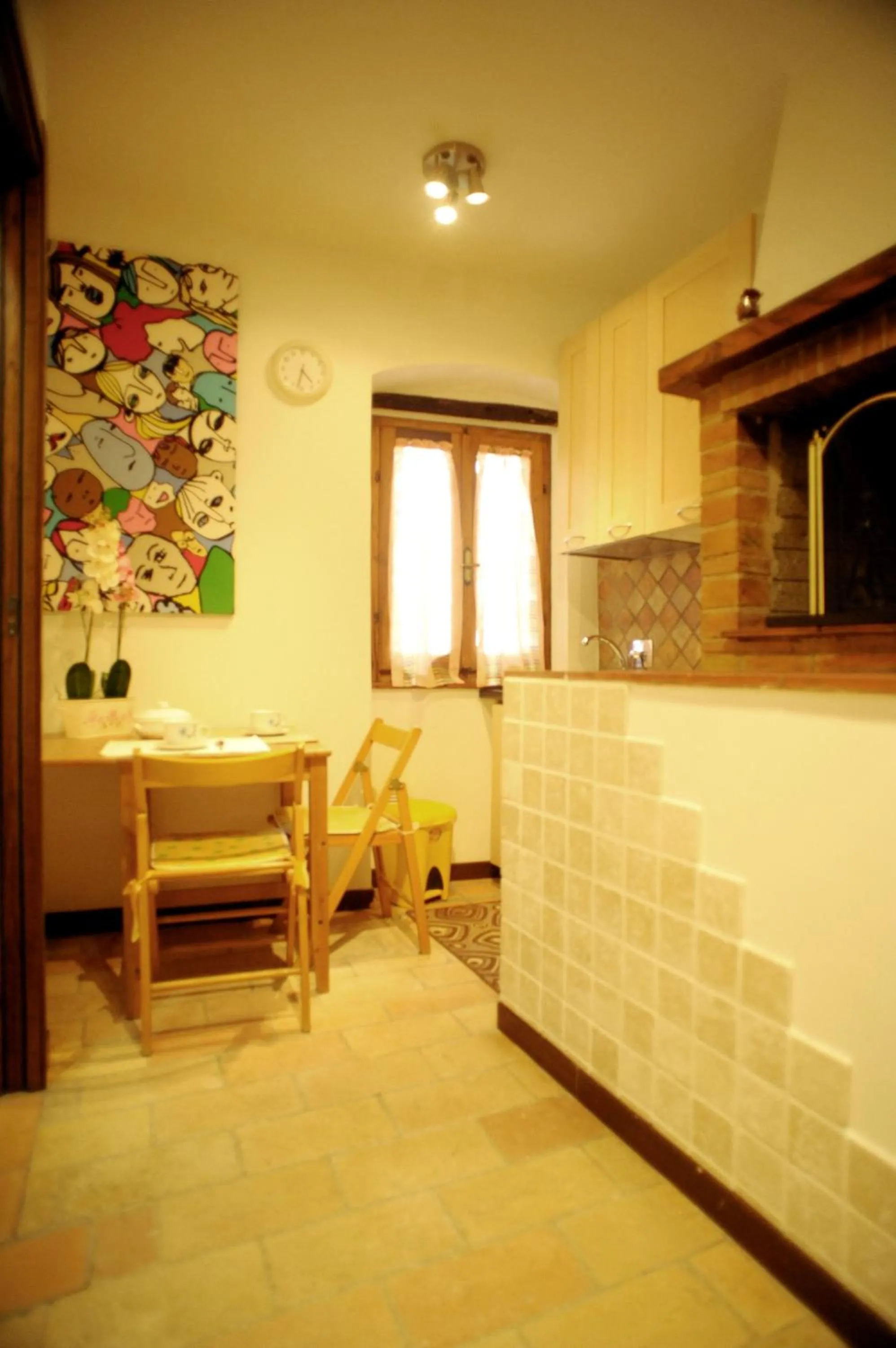 Kitchen or kitchenette in Appartamento Tulipano Rosa