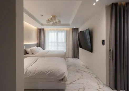 Bed in Gunsan Stay Tourist Hotel