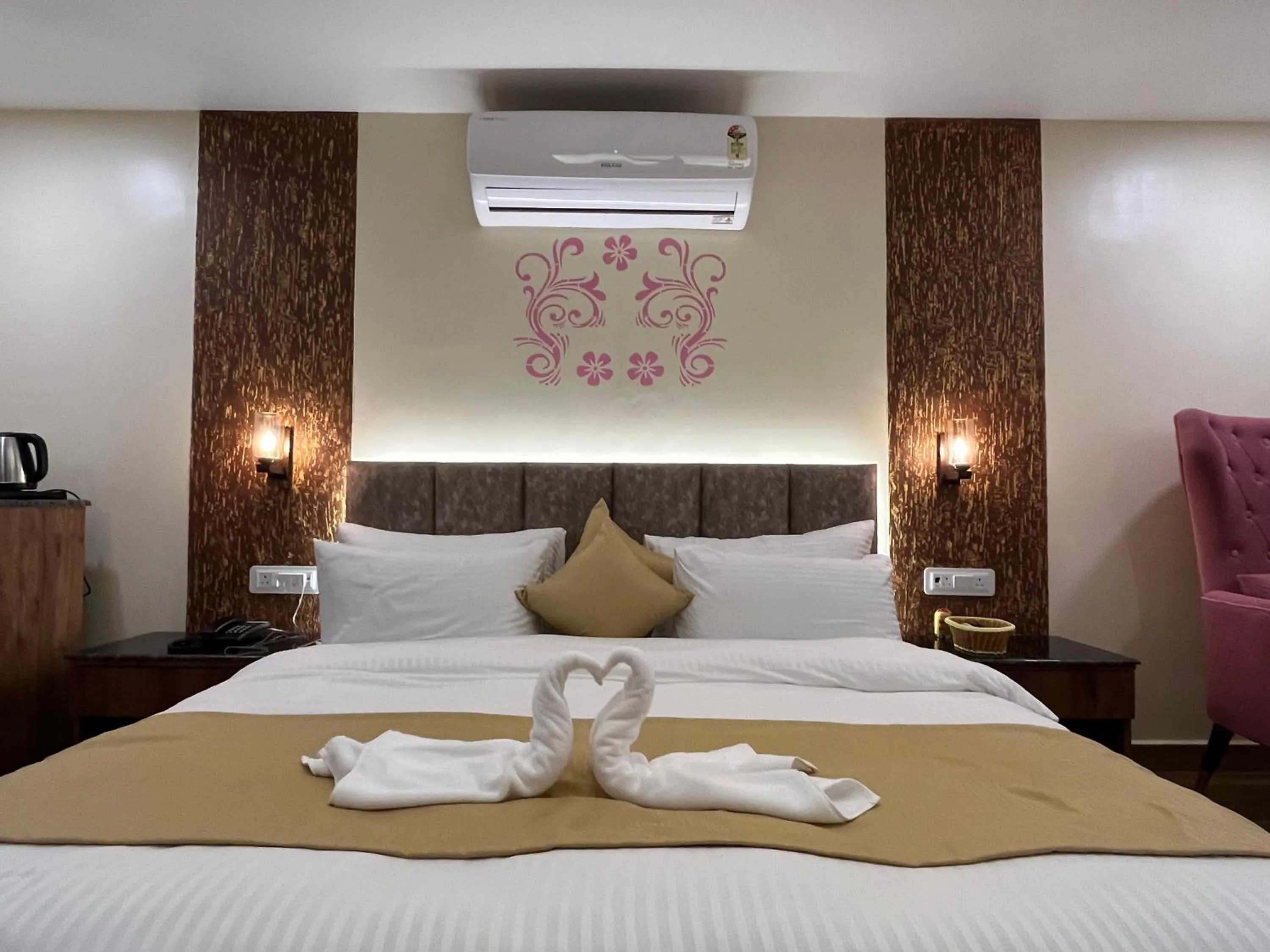 Bed in NIVEDAN HOTEL AND RESORT