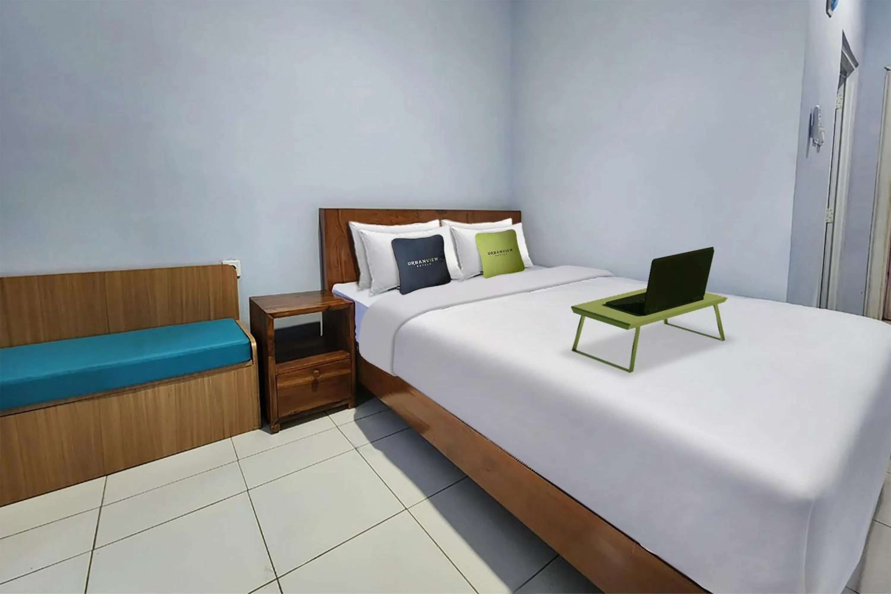 Bed in Urbanview Hotel Mutiara Persada Syariah Majalengka by RedDoorz