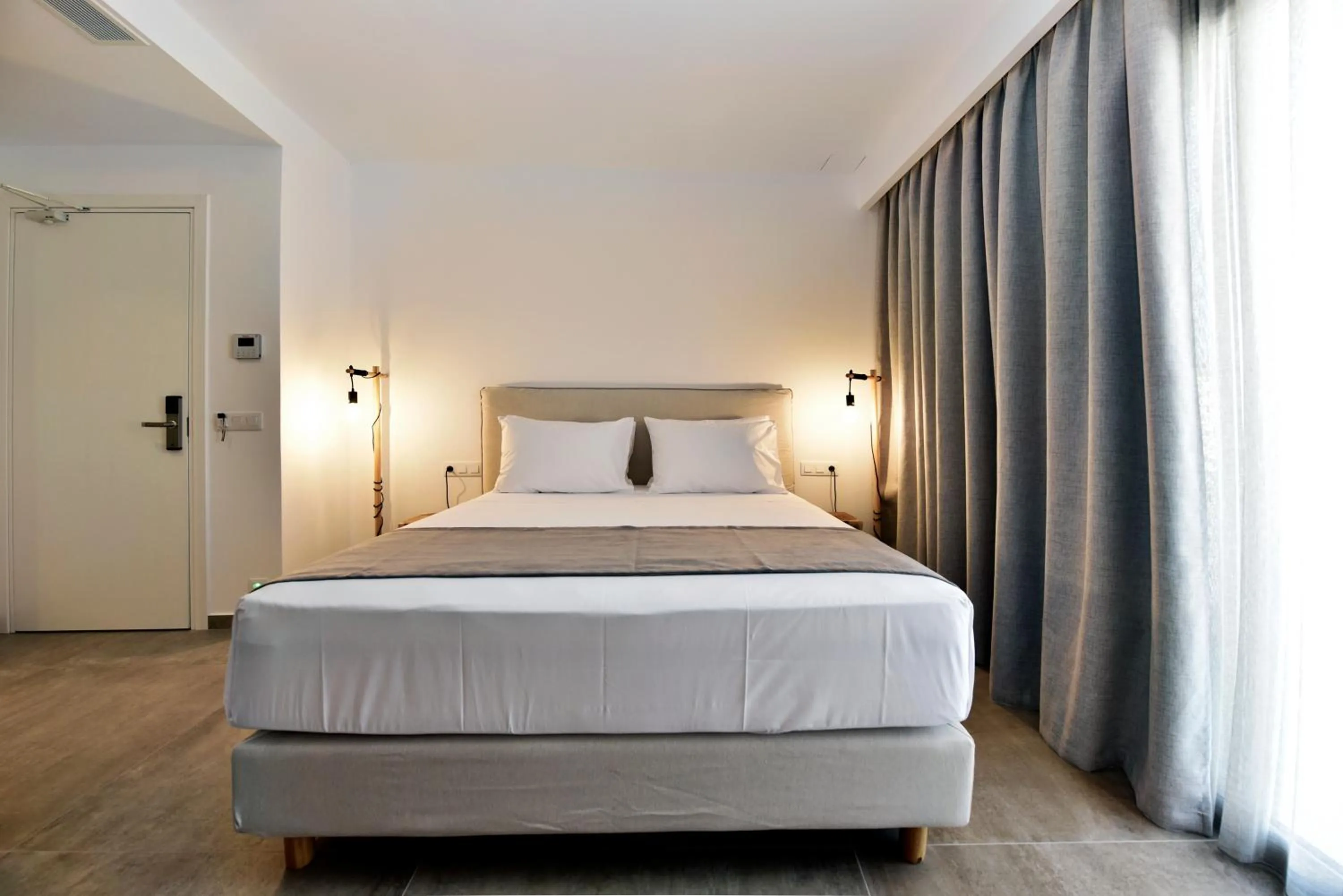 Bed in Anais Milos Suites