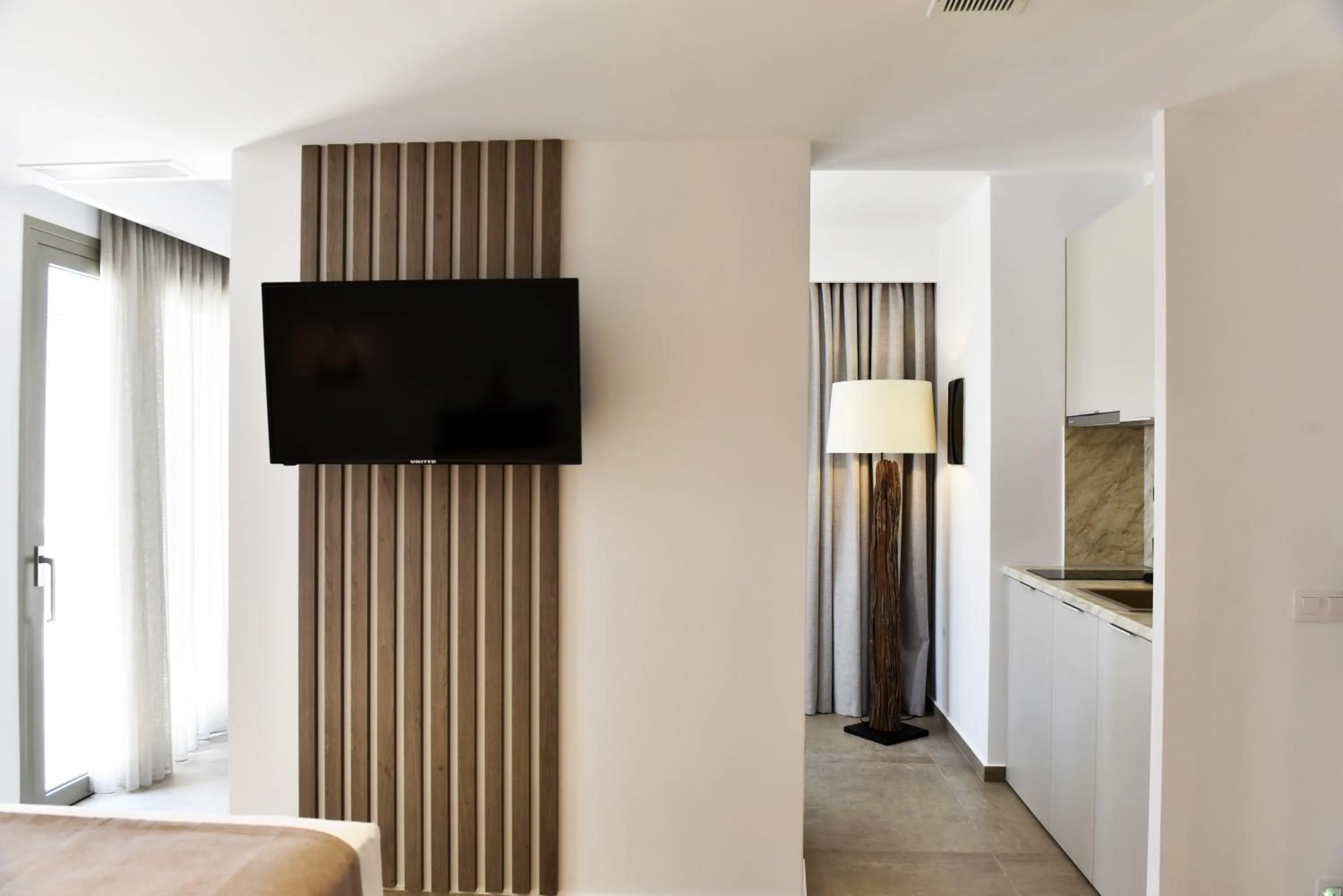 Bed in Anais Milos Suites