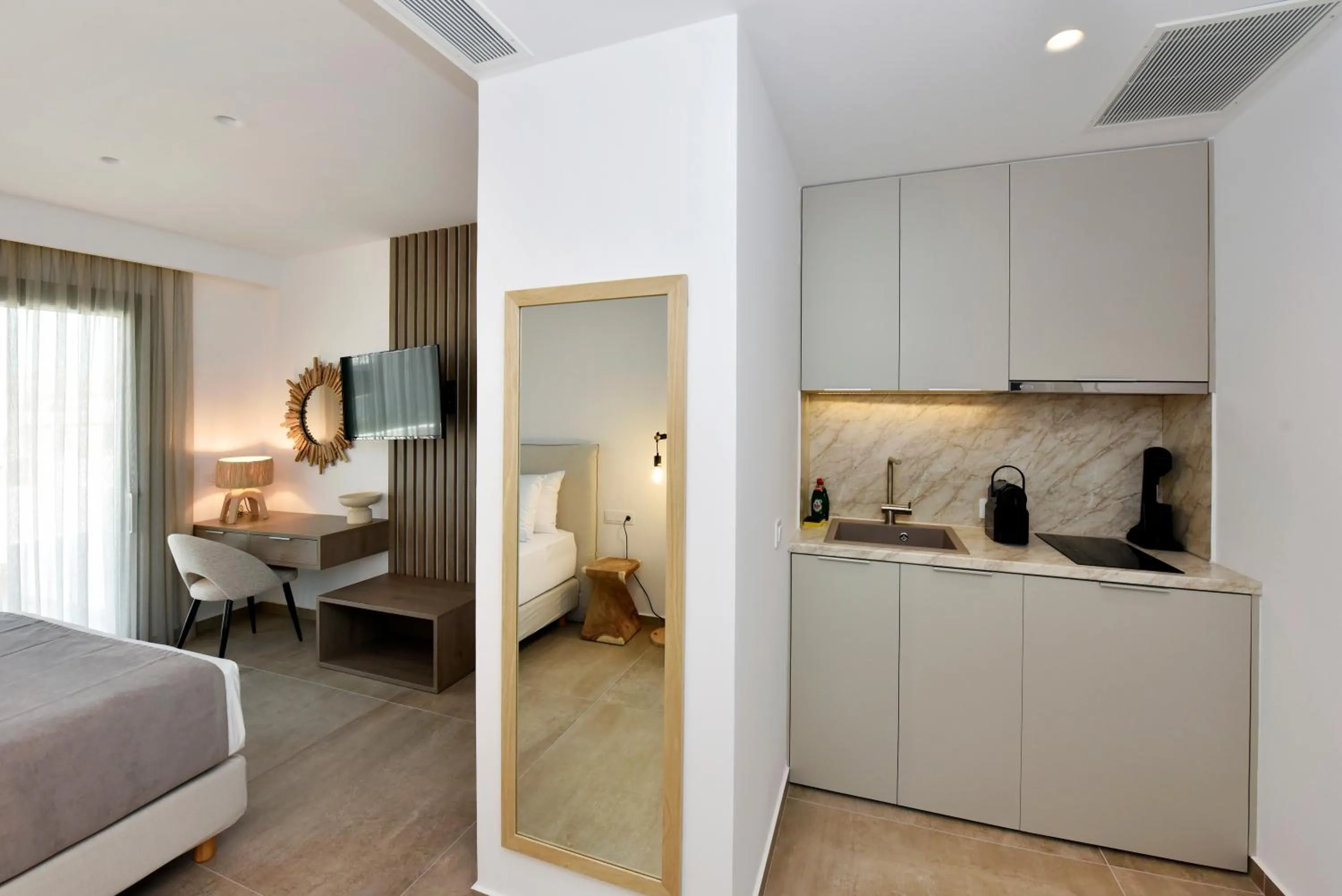 Bed in Anais Milos Suites