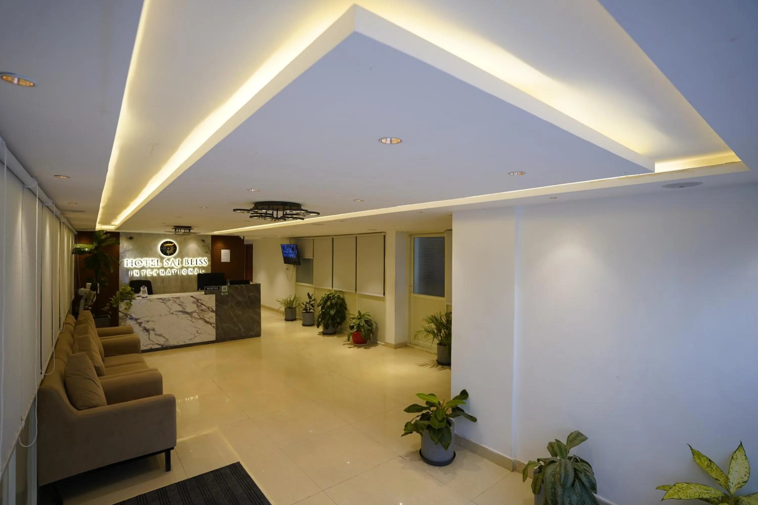 Seating area in Sai Bliss International, Manyata Tech Park