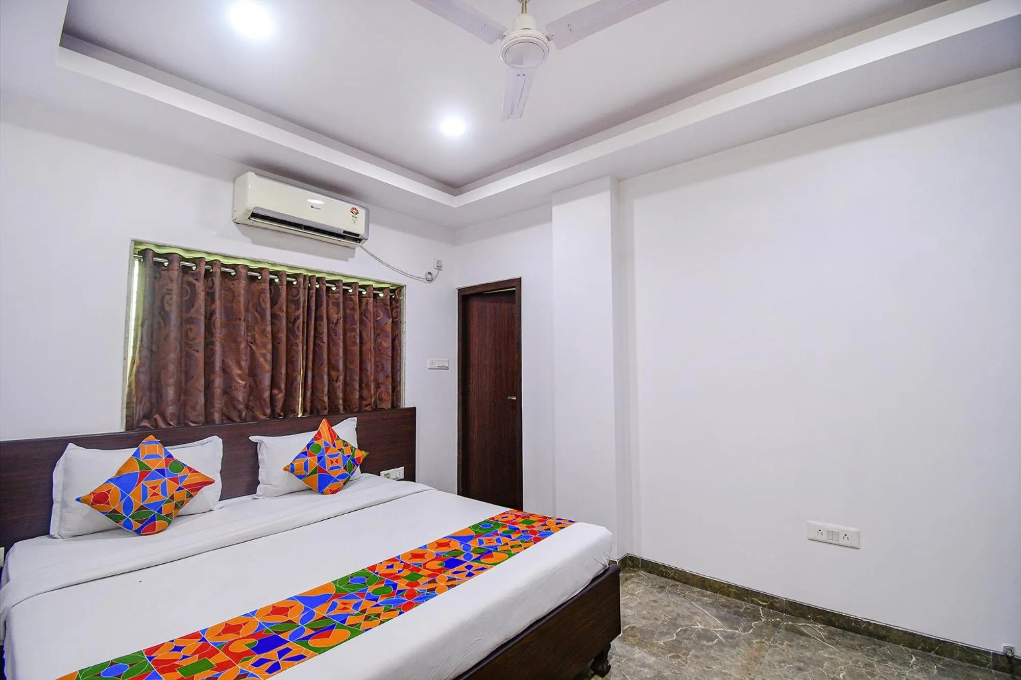 Bed in FabHotel Rani Tower - Chinar Park