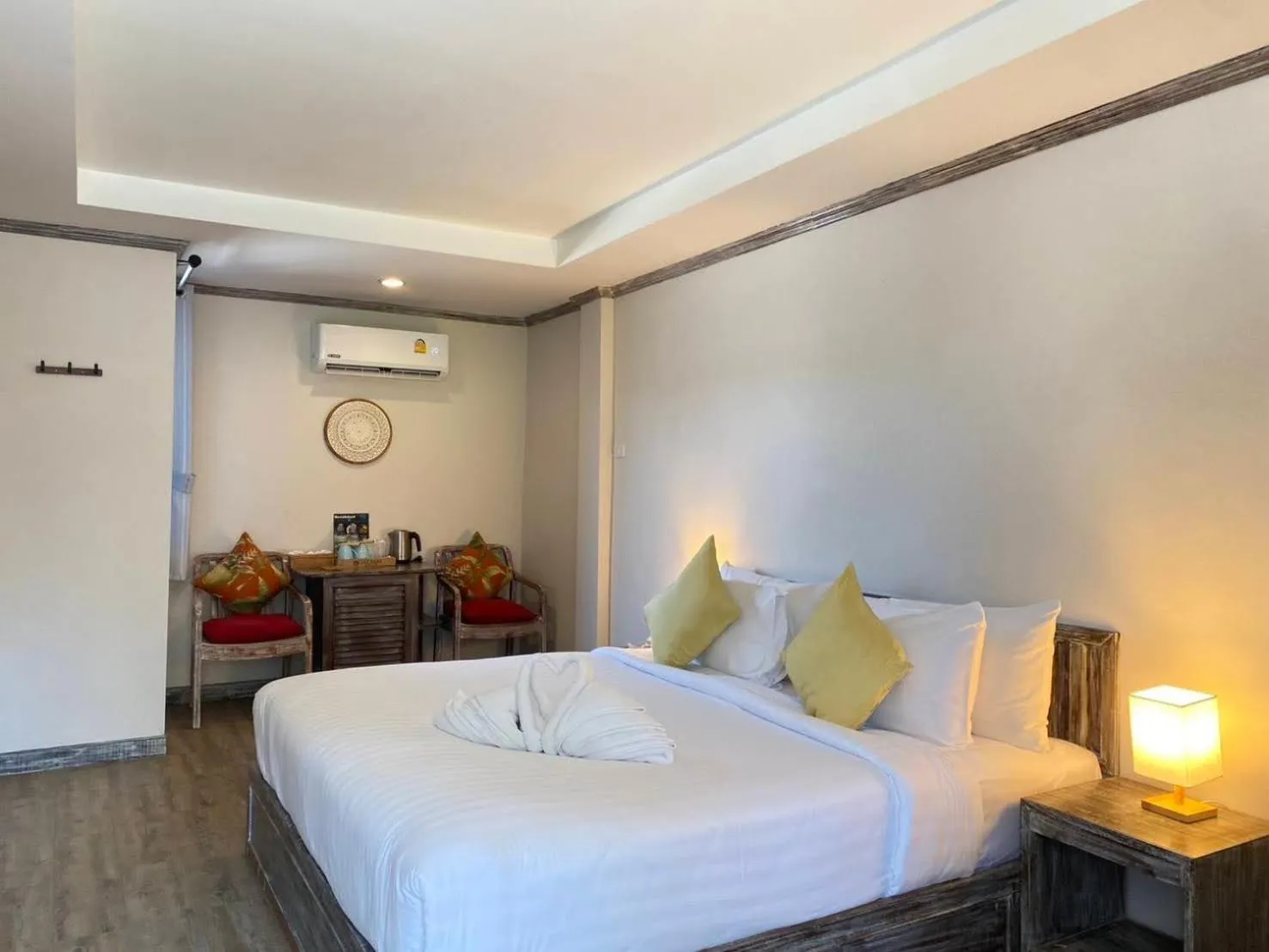 Bed in JALMIN Hotel Samui