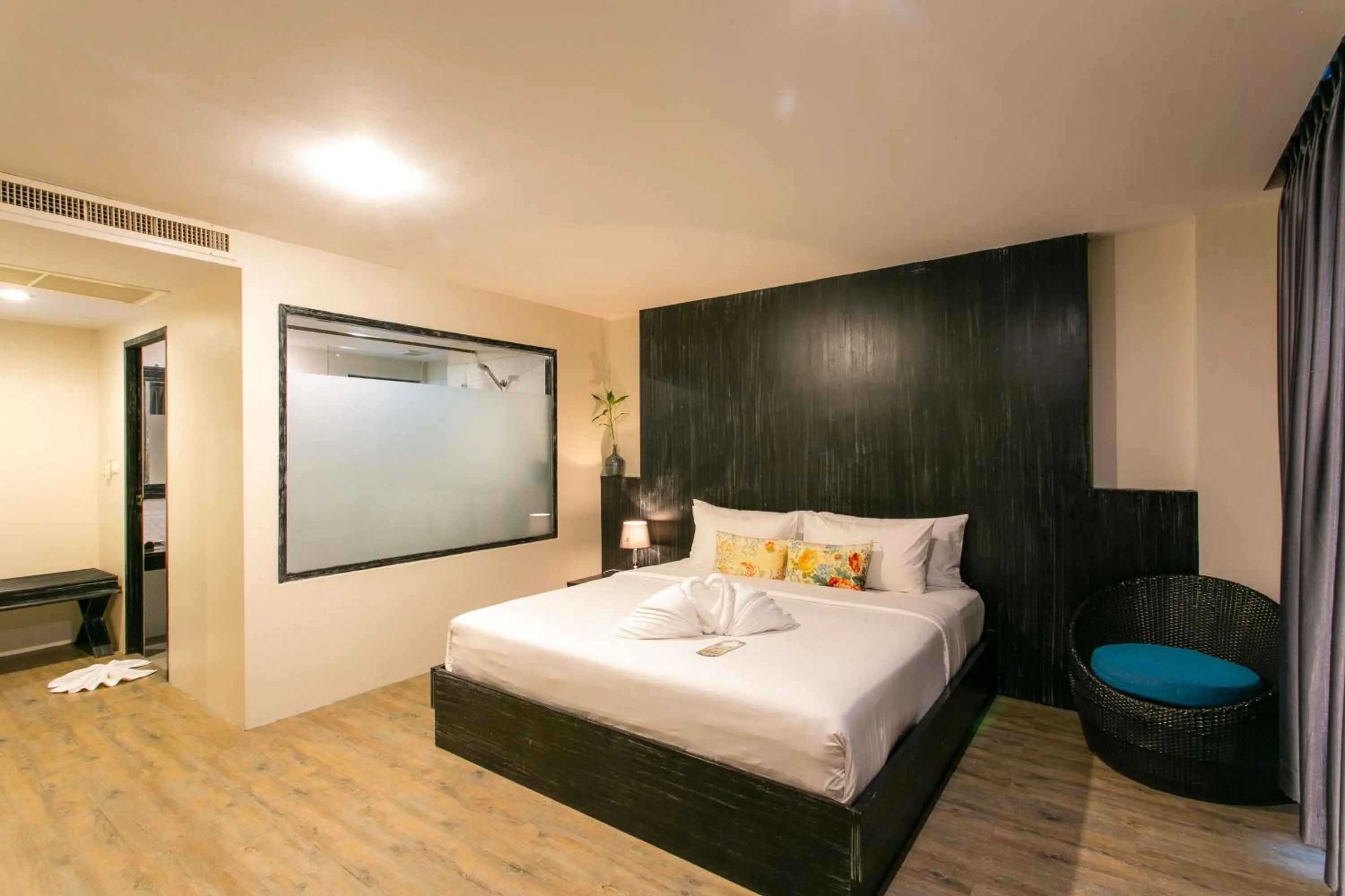 Bed in JALMIN Hotel Samui