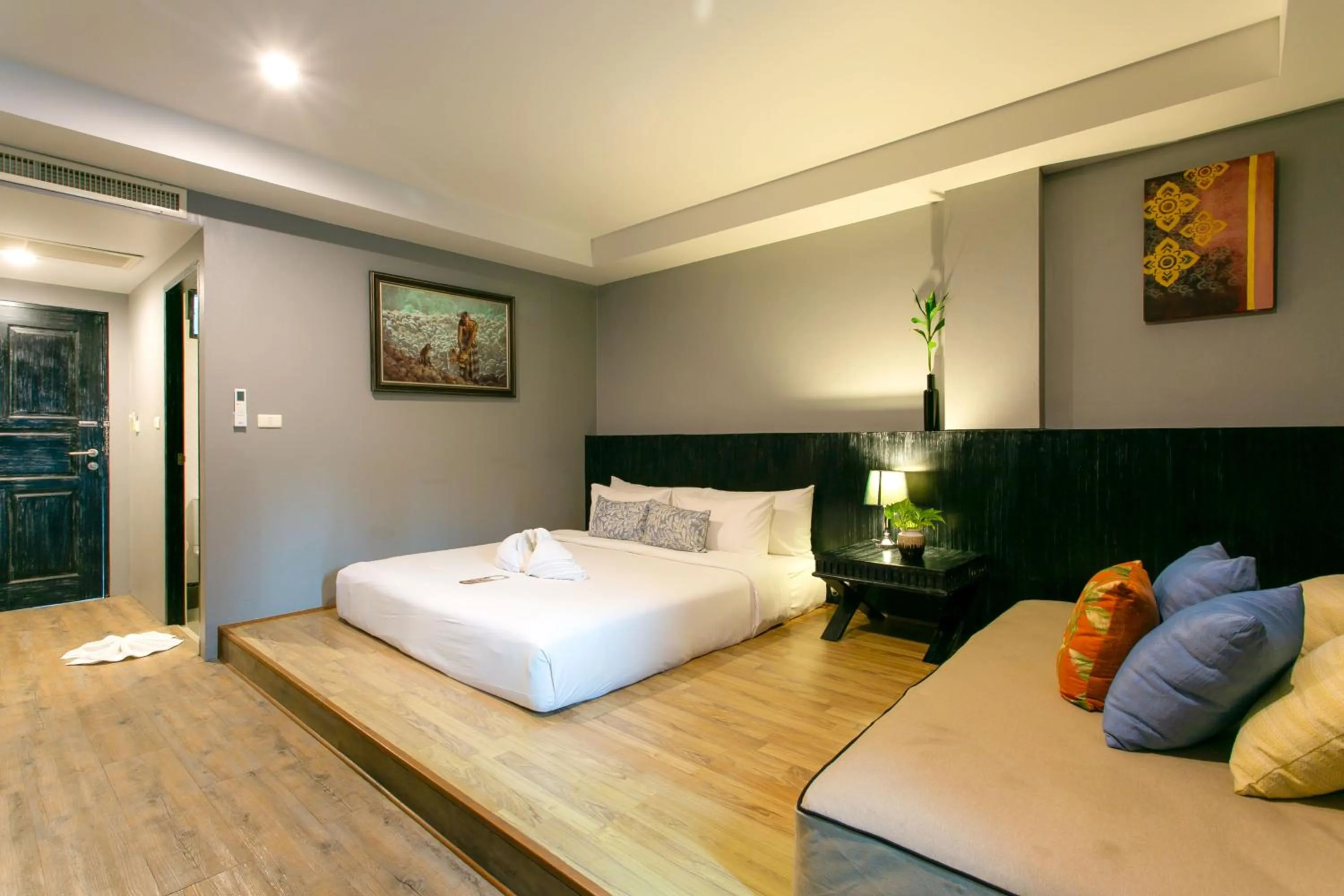 Bed in JALMIN Hotel Samui