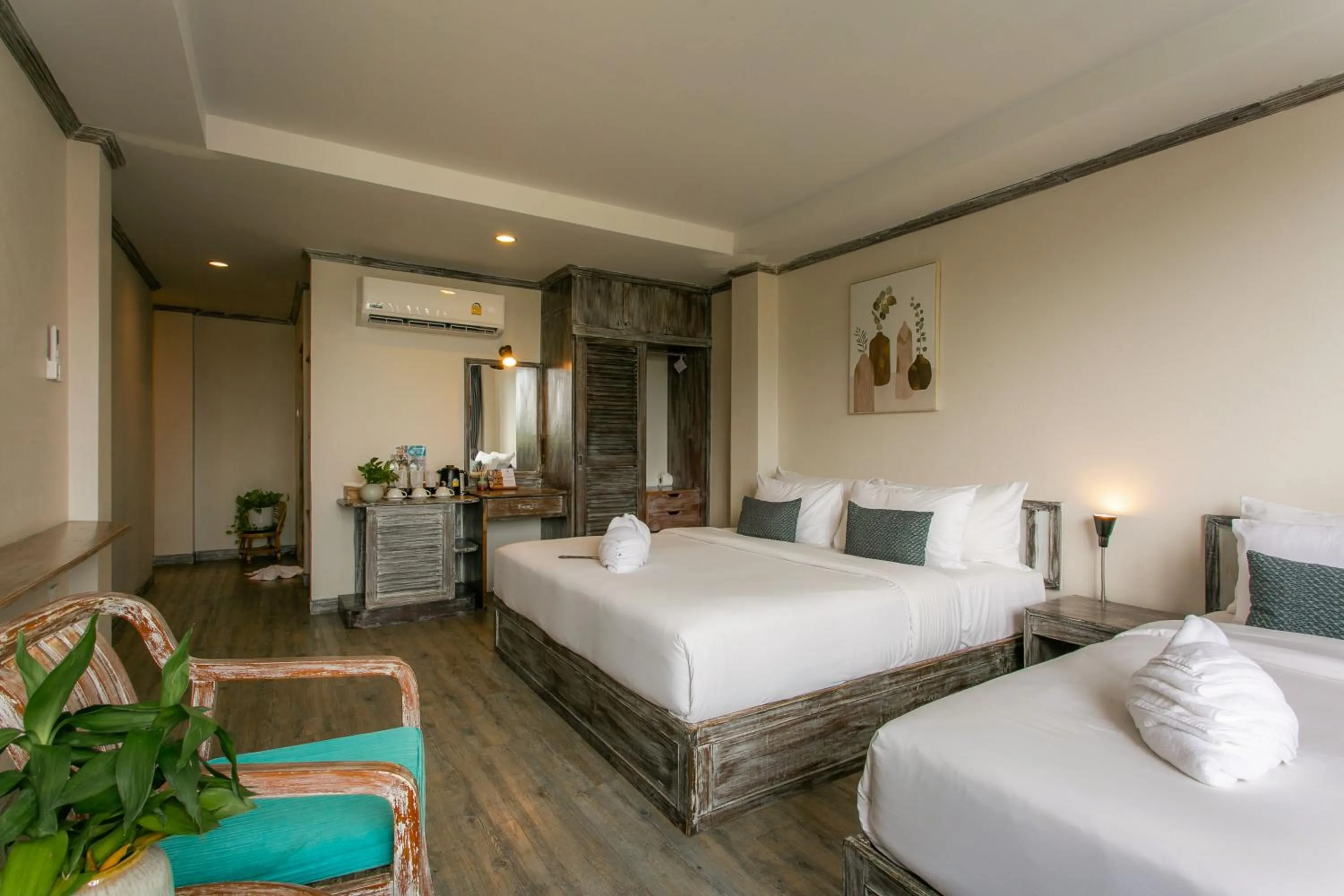 Bed in JALMIN Hotel Samui