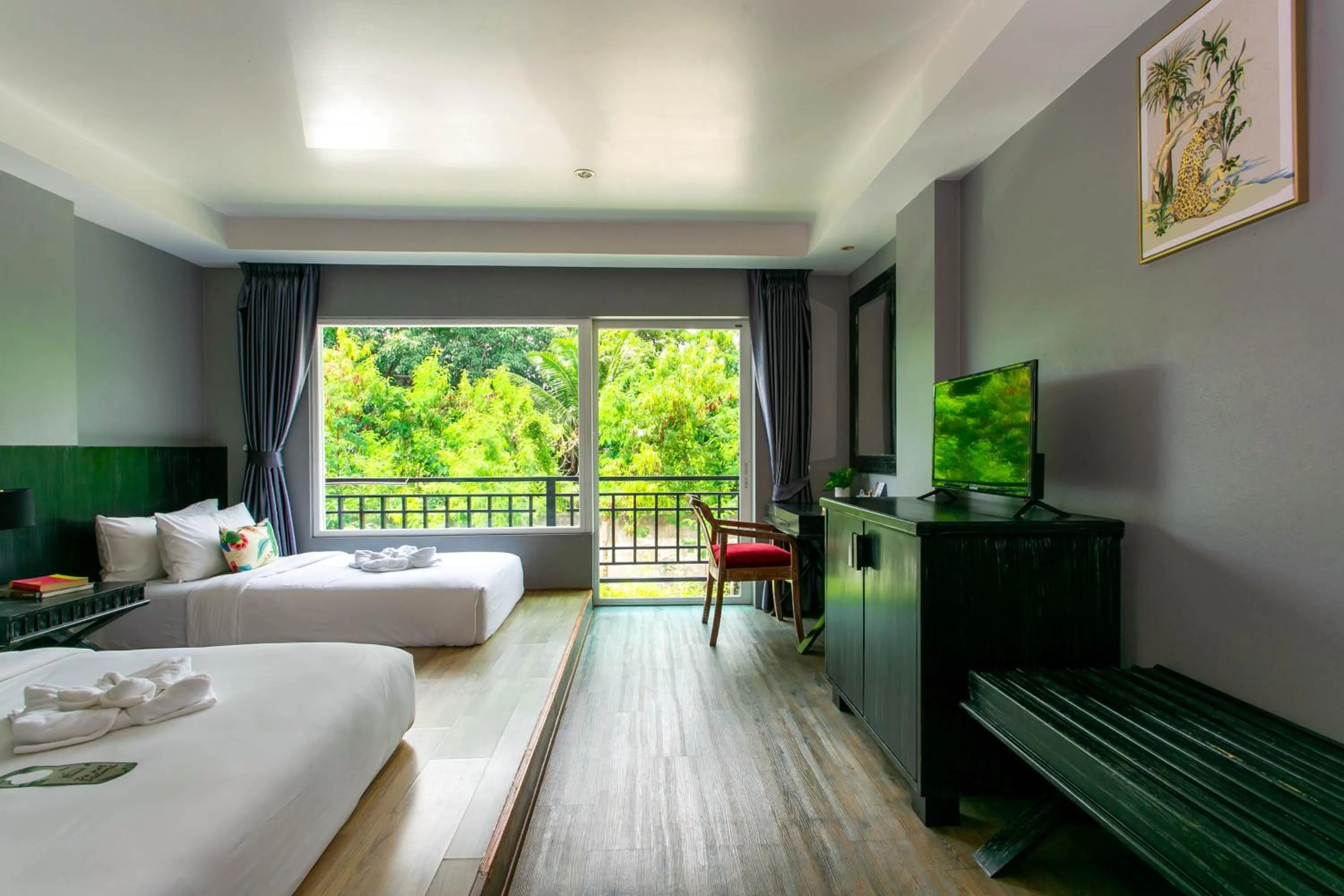 Bed in JALMIN Hotel Samui