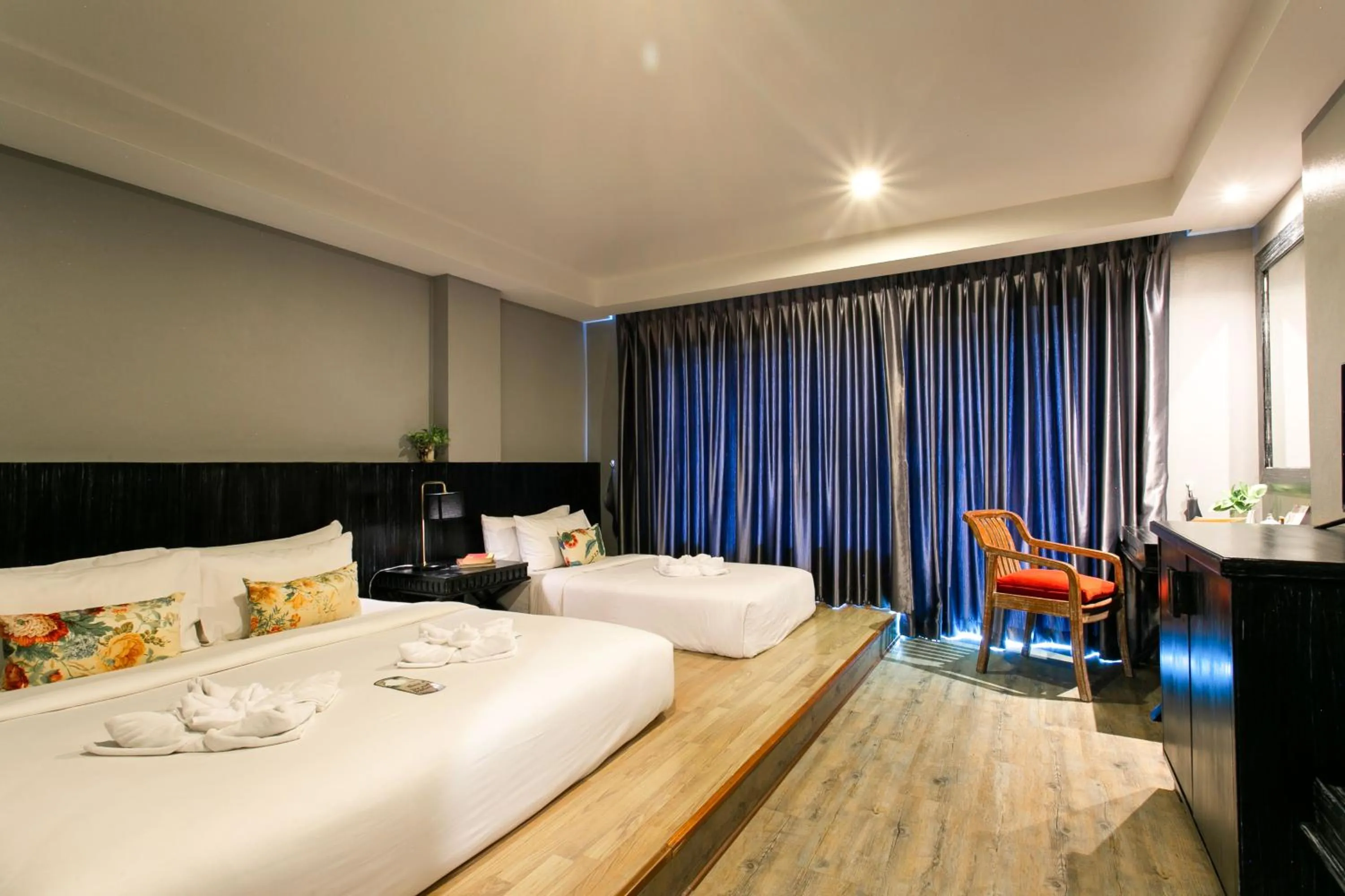 Bed in JALMIN Hotel Samui