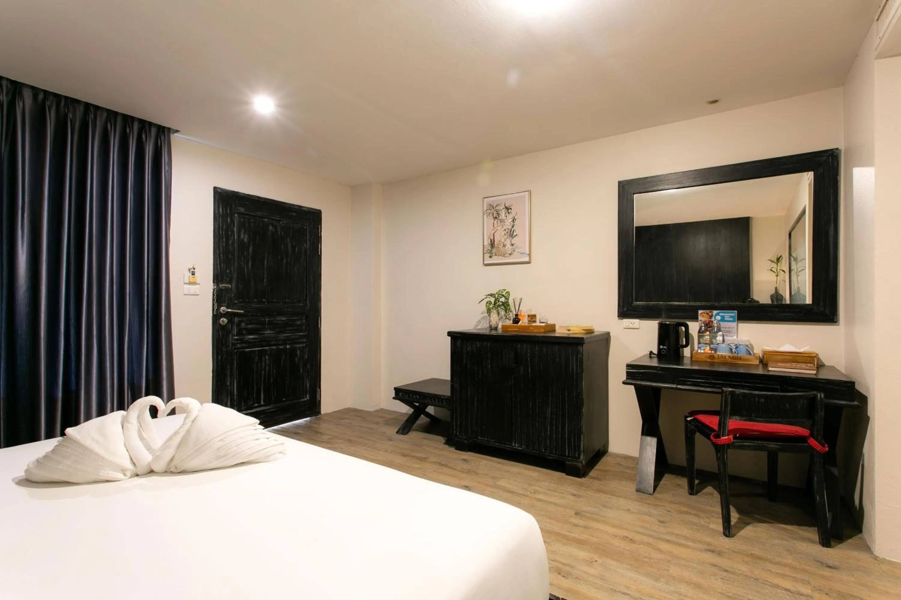 Bed in JALMIN Hotel Samui