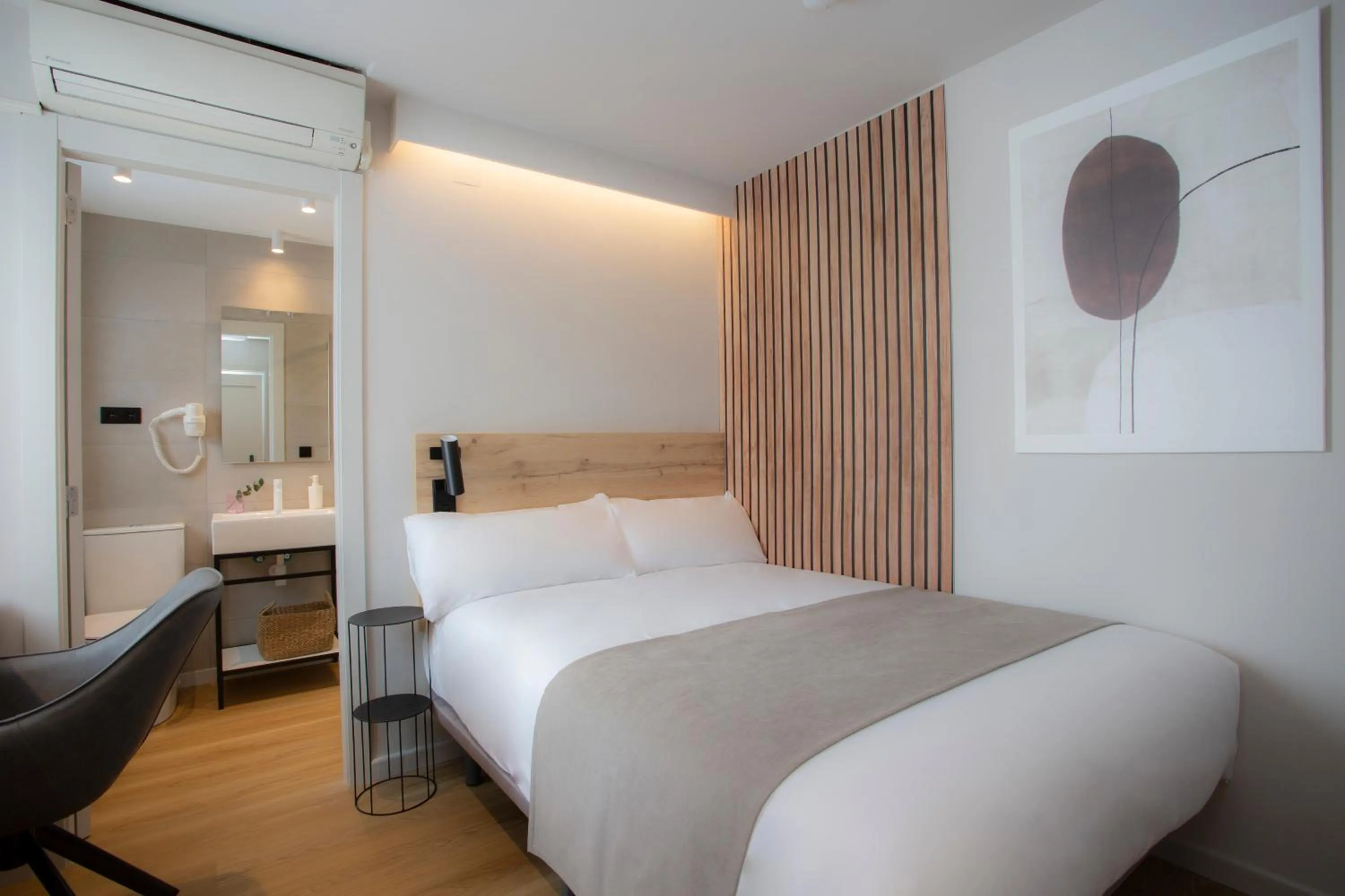 Bed in Aila II Hotel Boutique by SingularStays - Digital Access