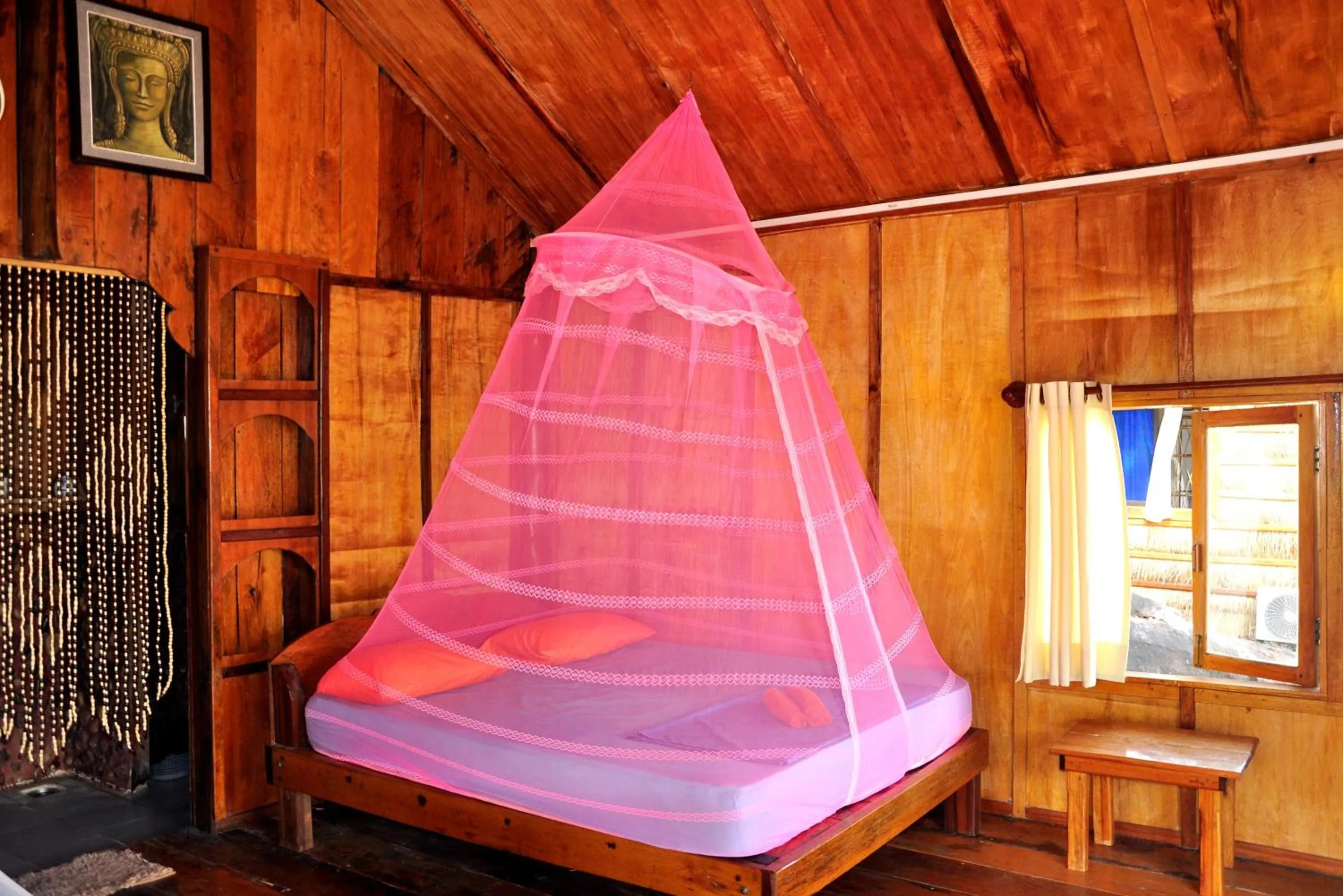 Bed in White Beach Bungalows