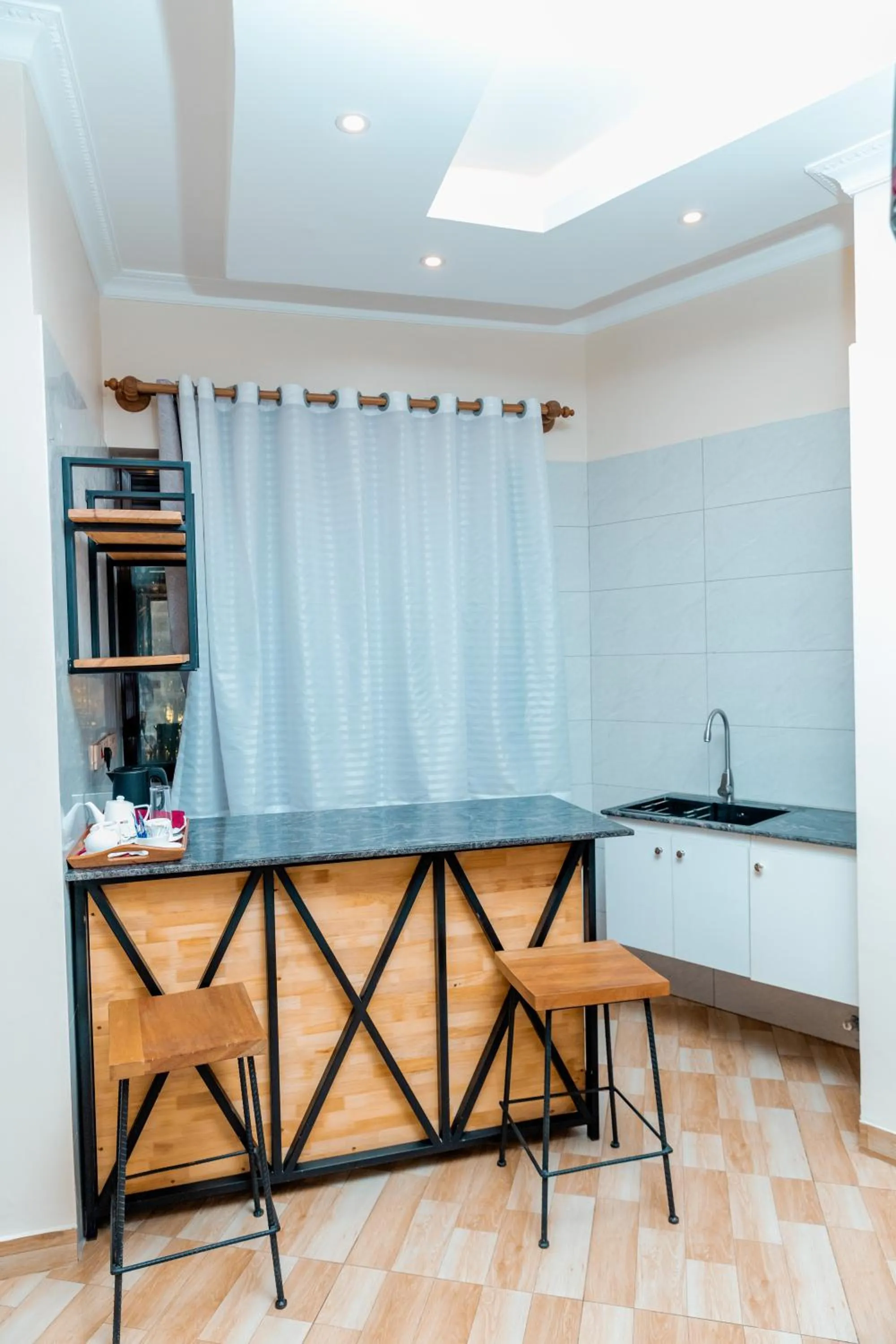 Kitchen or kitchenette in Las Vegas Garden Hotel Mbarara