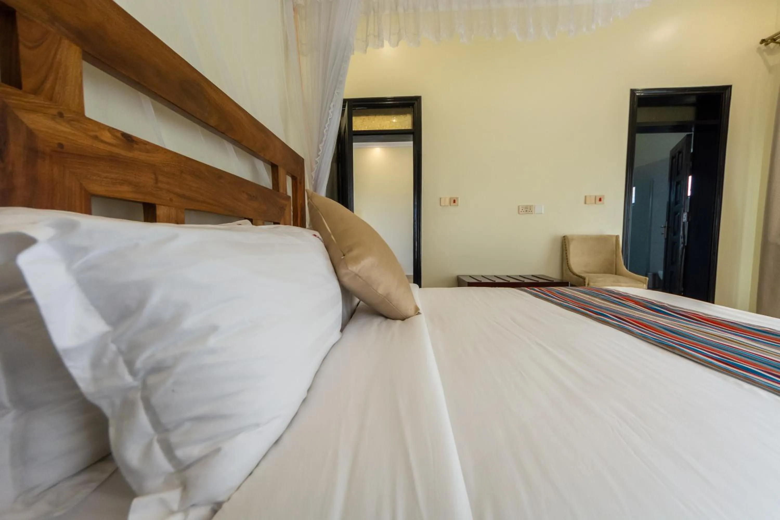 Bed in Las Vegas Garden Hotel Mbarara