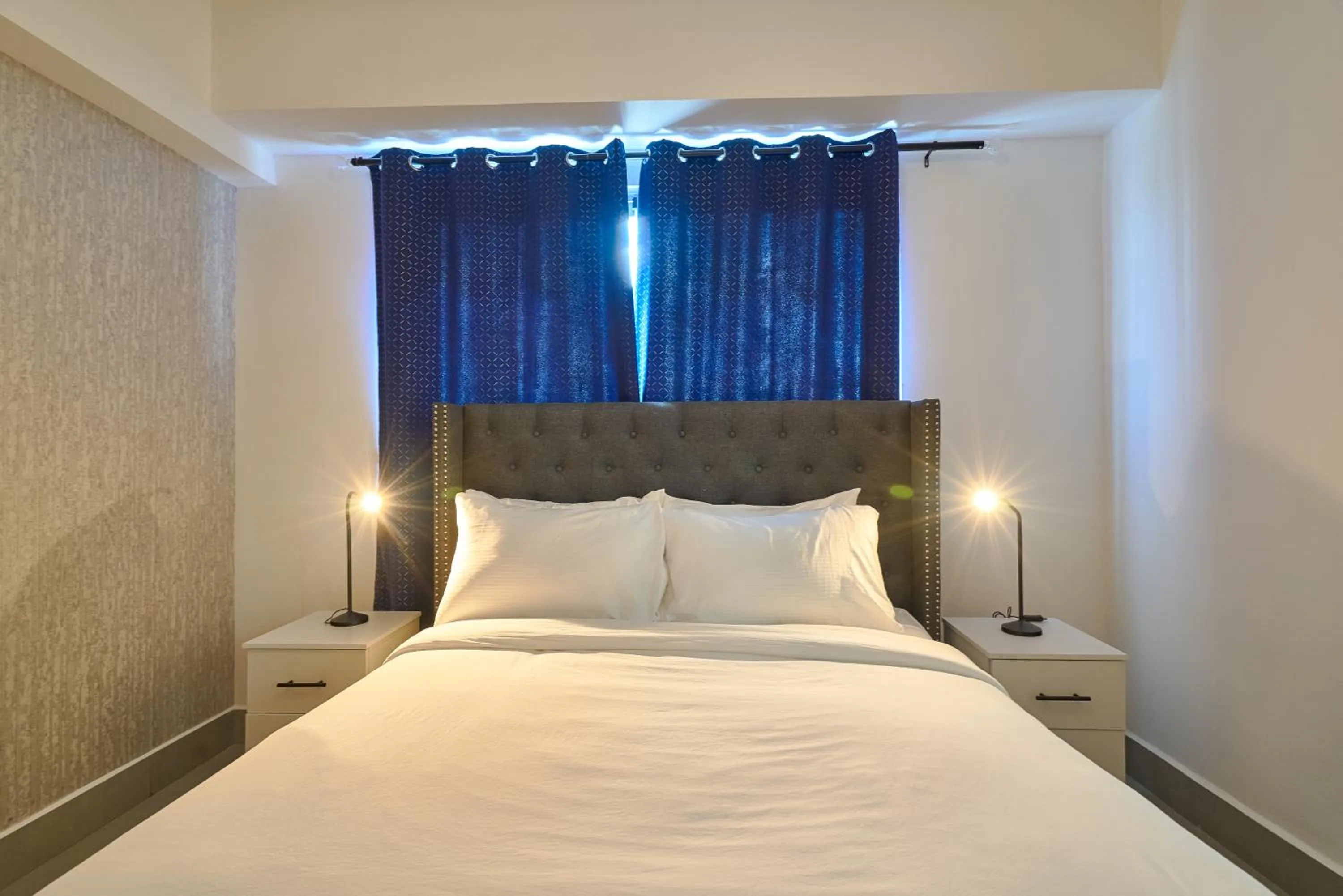 Bed in Central Suites Tower