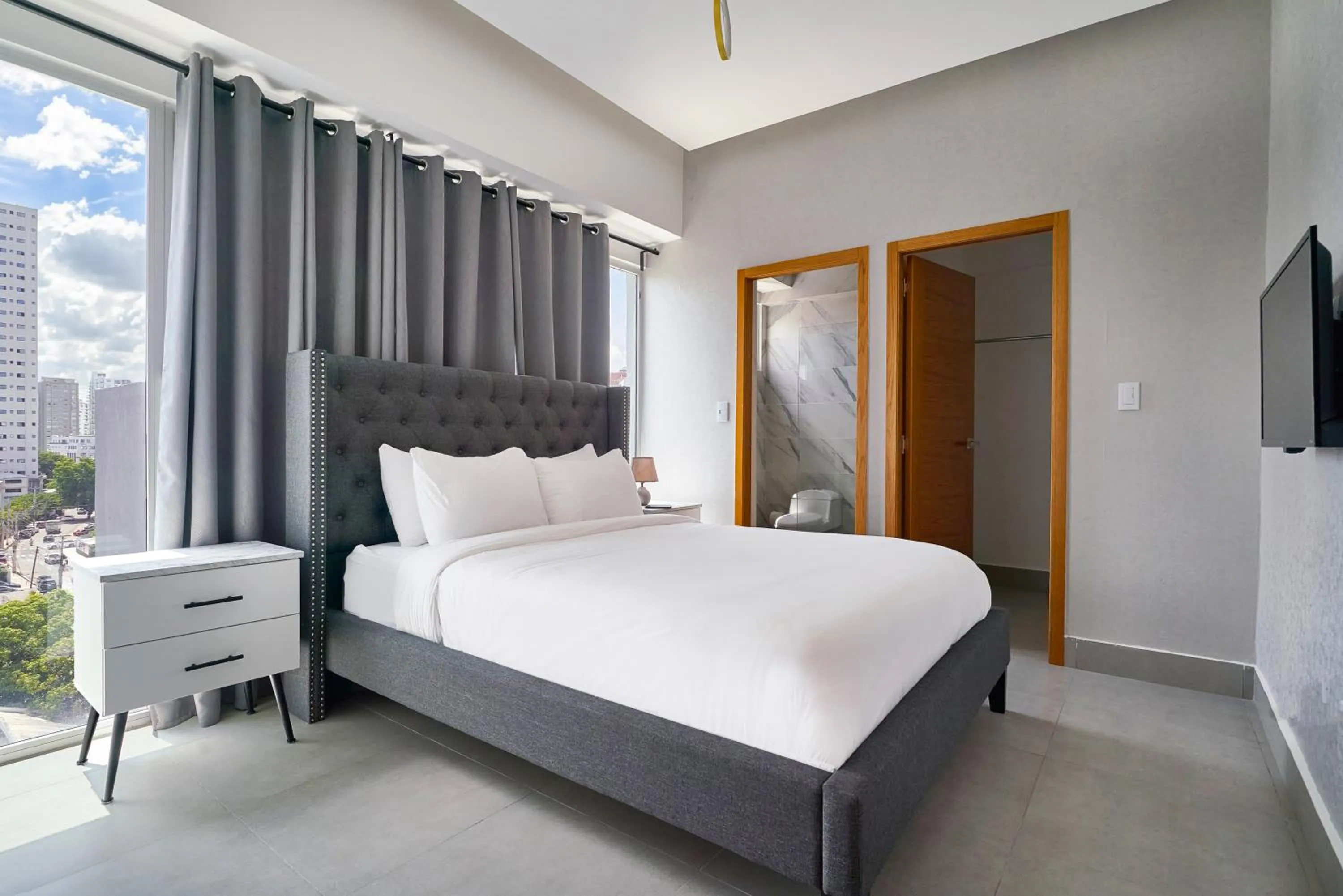 Bed in Central Suites Tower