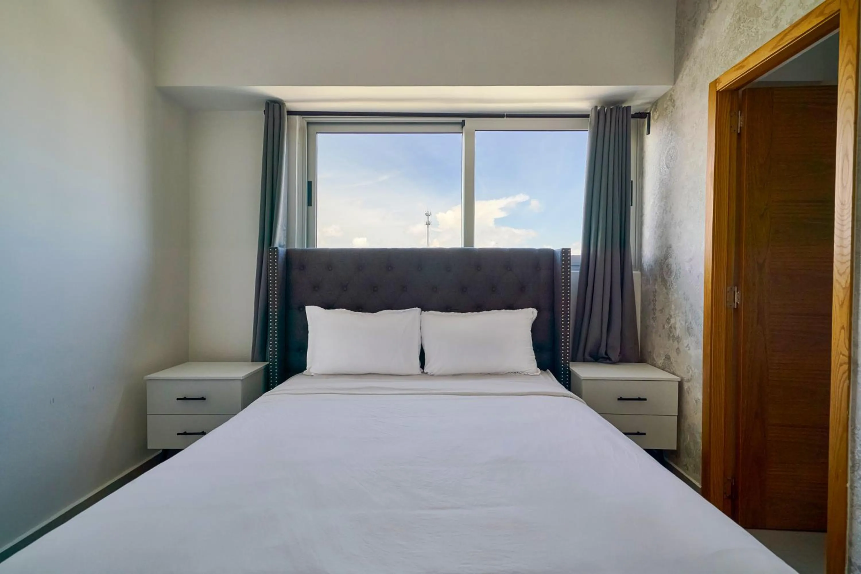 Bed in Central Suites Tower