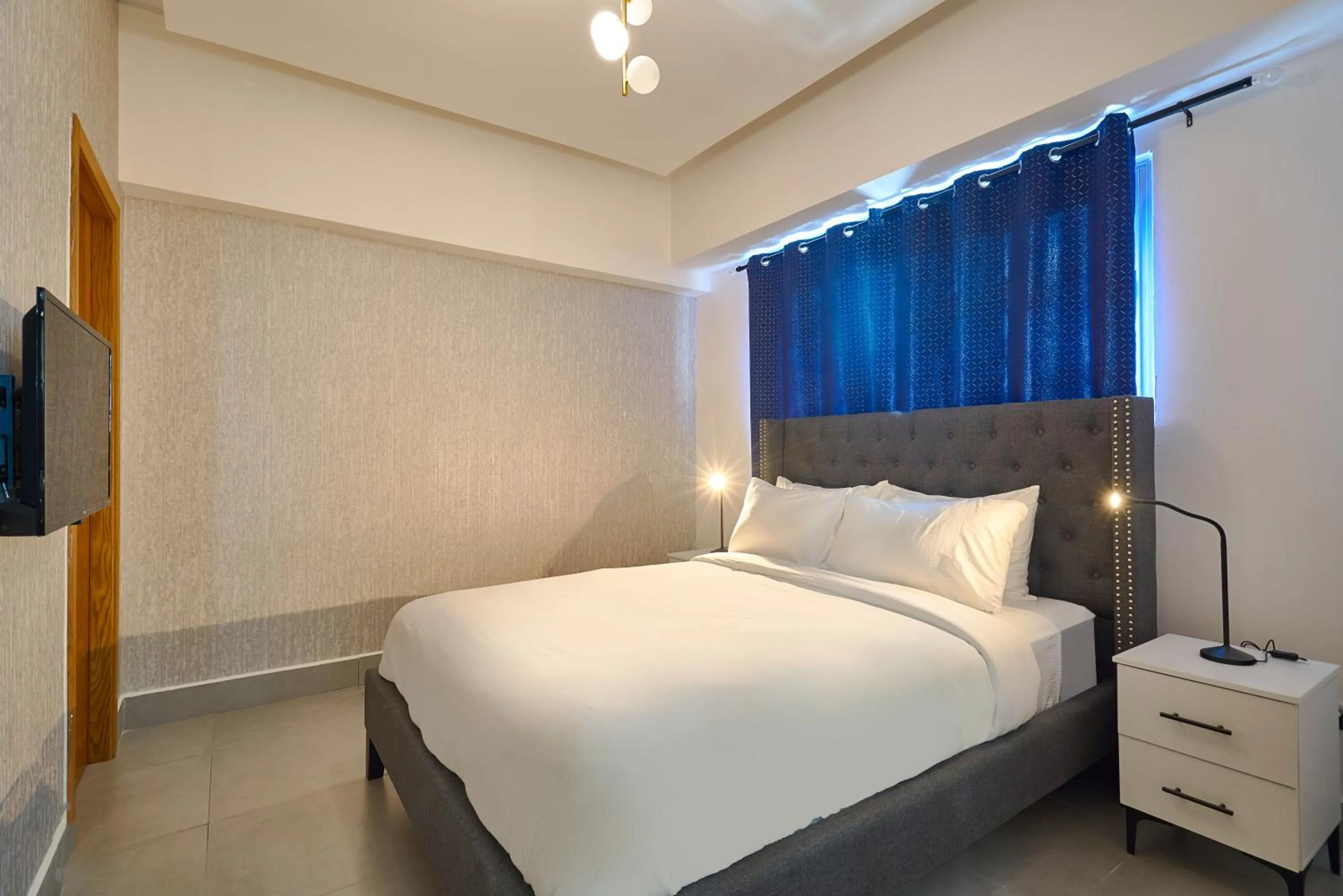 Bed in Central Suites Tower