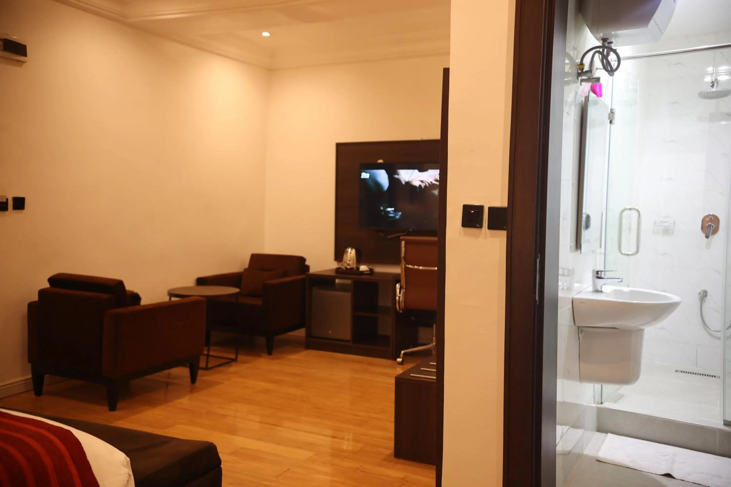 Shower in Bolton White Hotel - Abuja