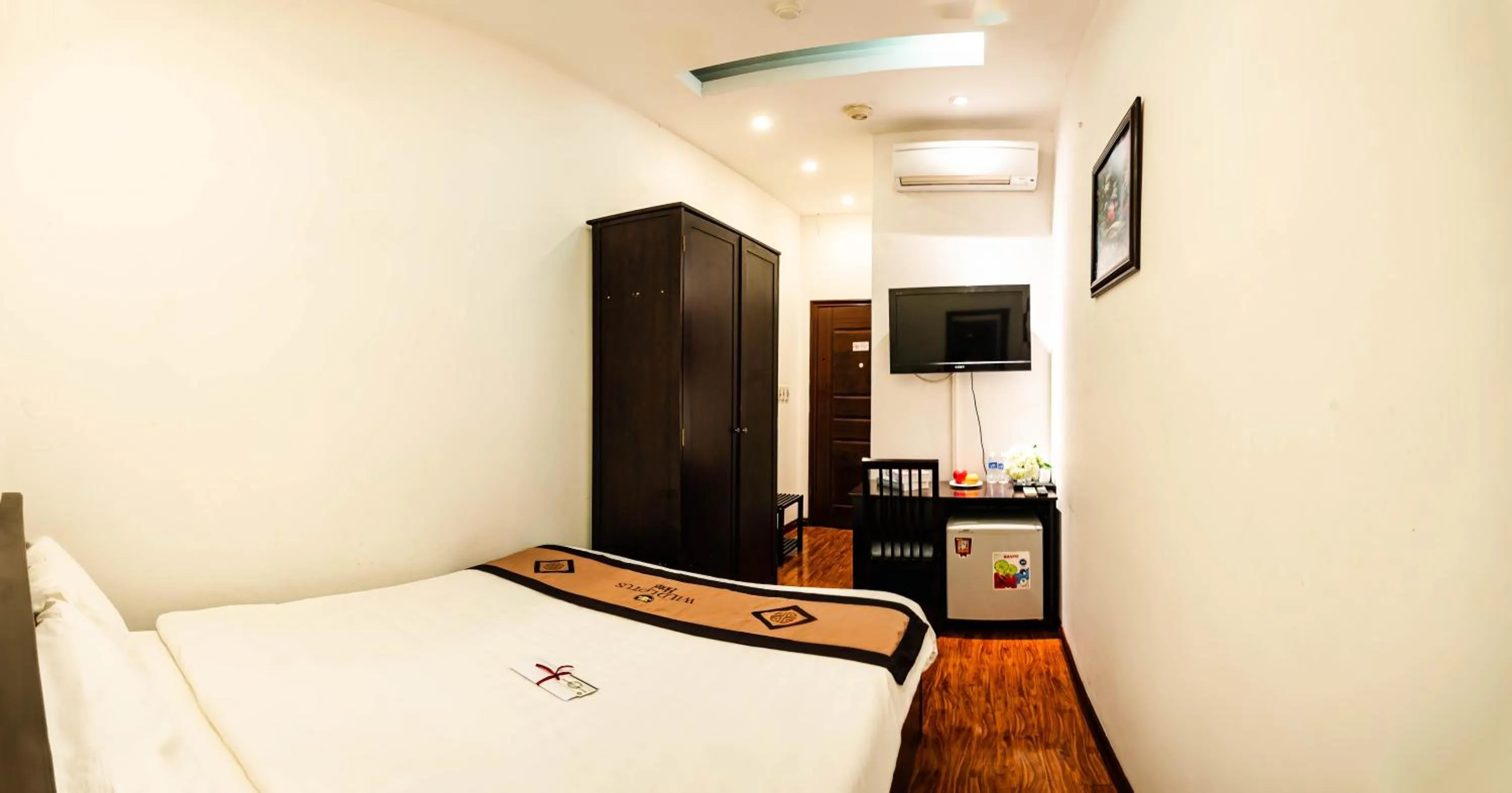 Bed in Wild Lotus Hotel & Travel 2